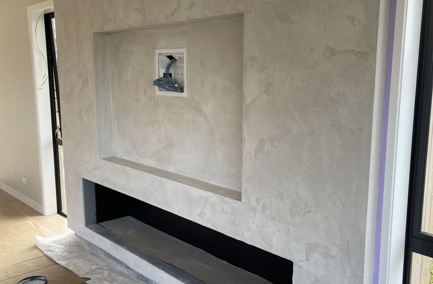 Resistone microcement fireplace