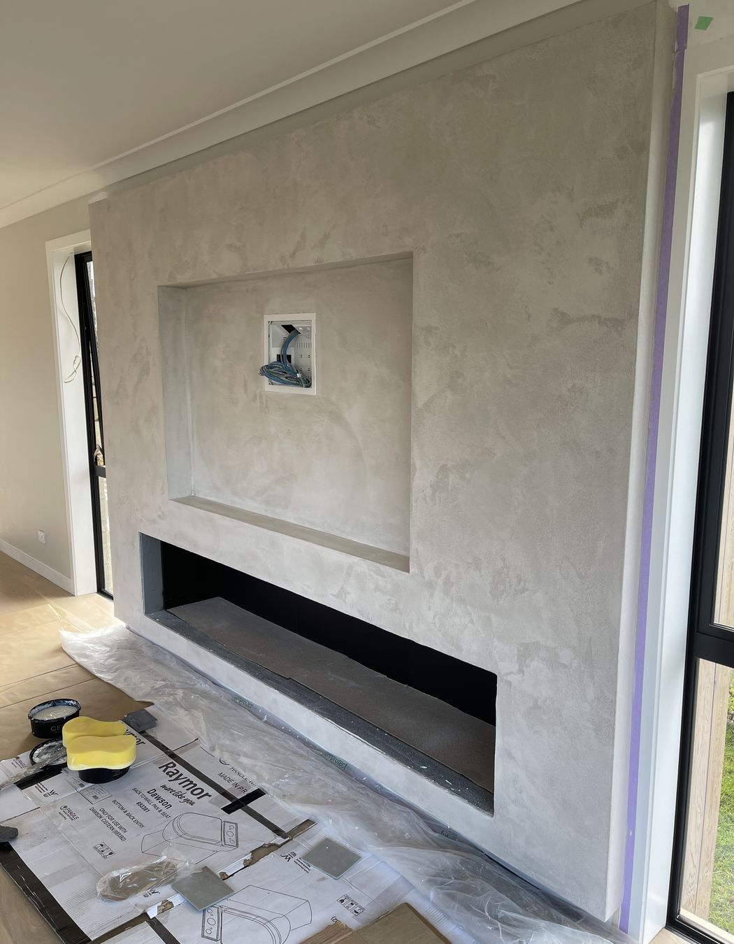 Resistone microcement fireplace
