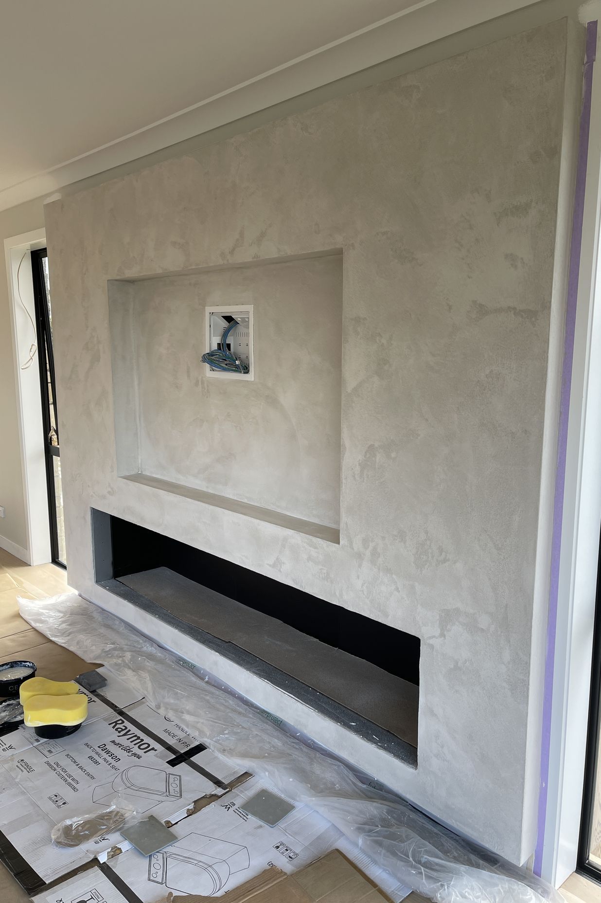 Resistone microcement fireplace