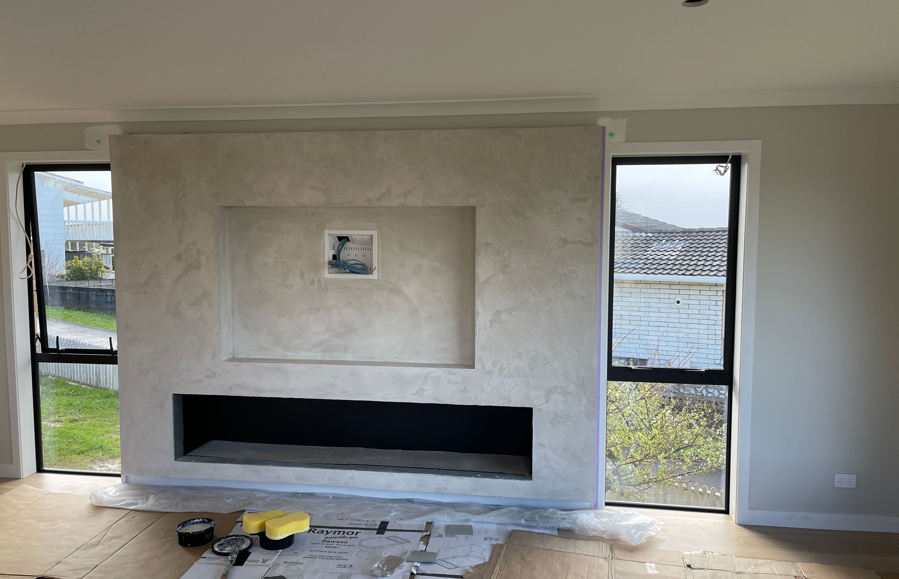 Resistone microcement fireplace