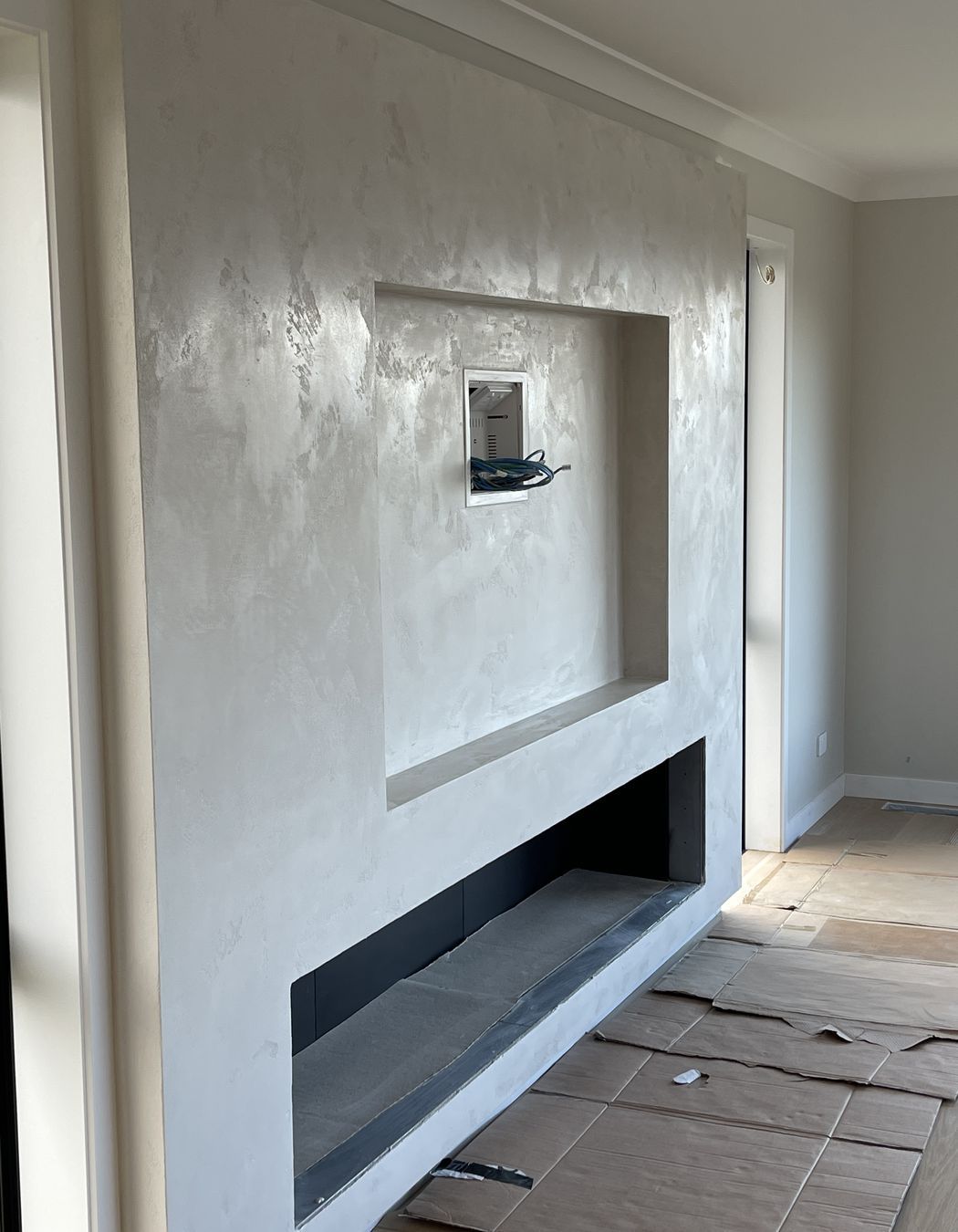 Resistone microcement fireplace