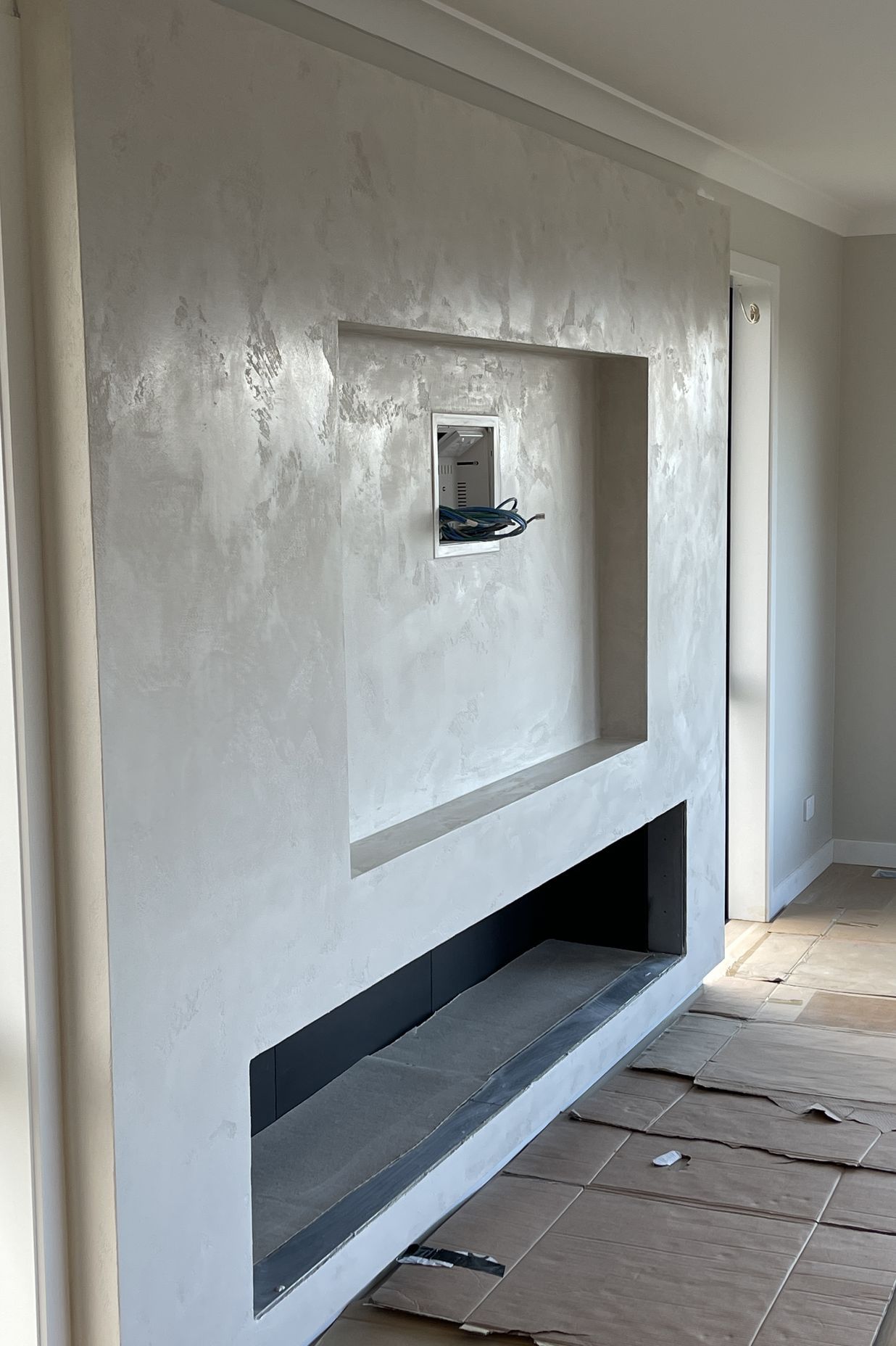 Resistone microcement fireplace