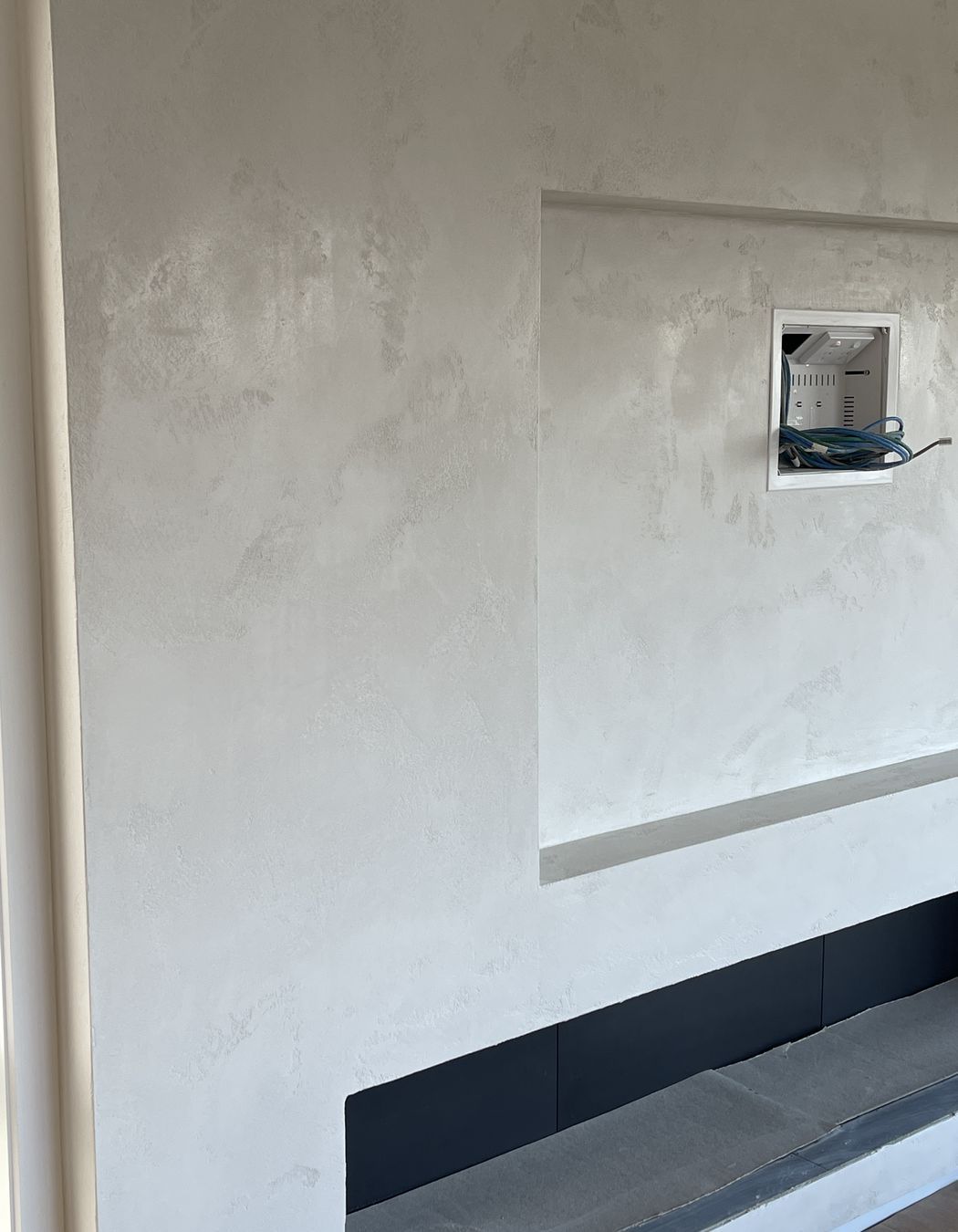 Resistone microcement fireplace