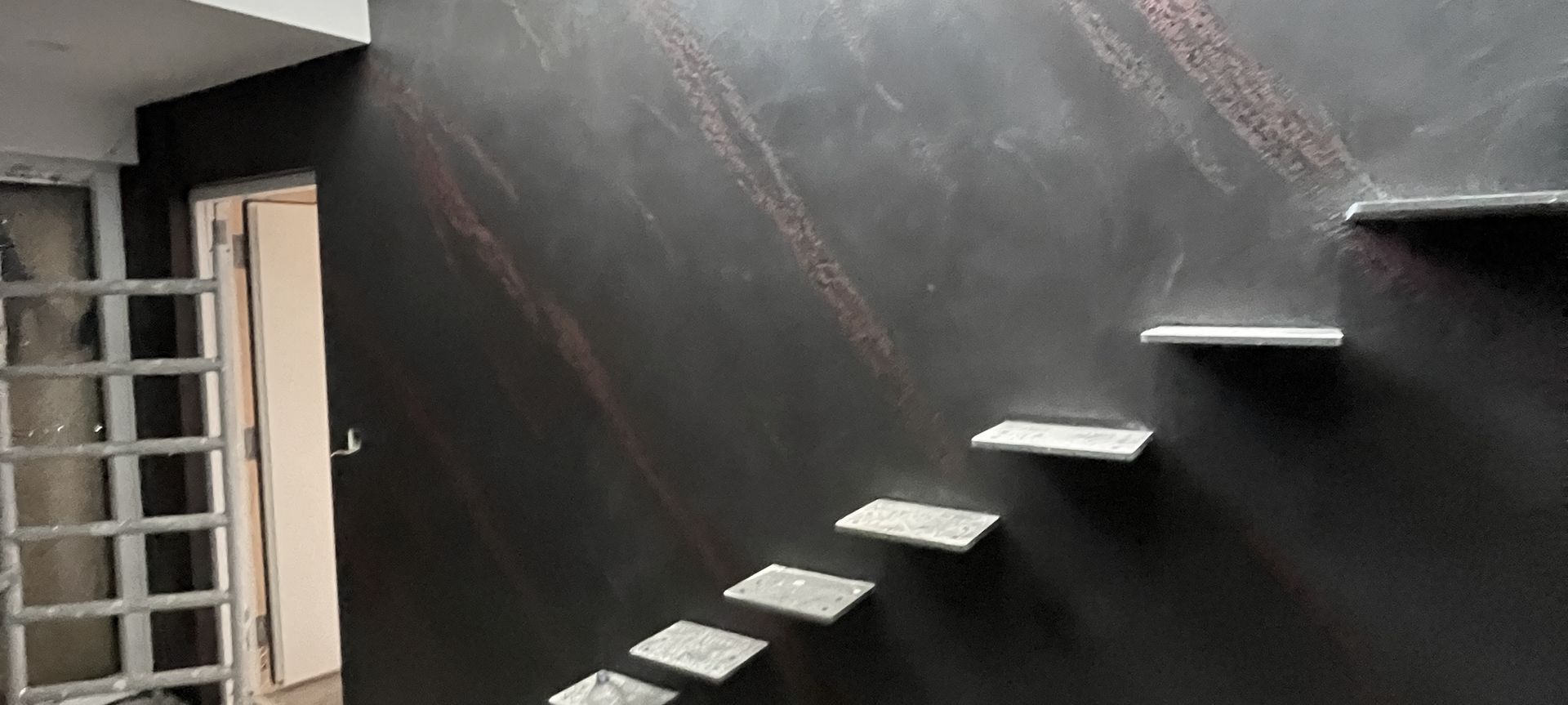 Resistone microcement stairway banner