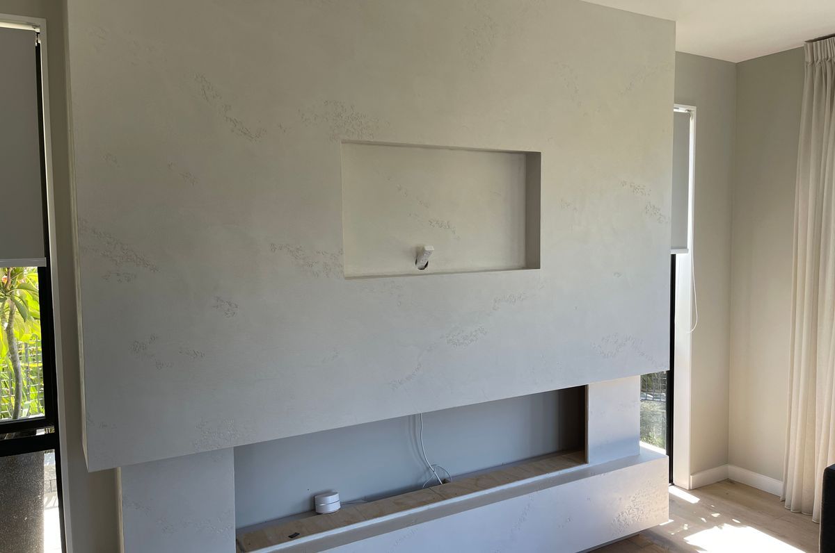 Resistone microcement fireplace
