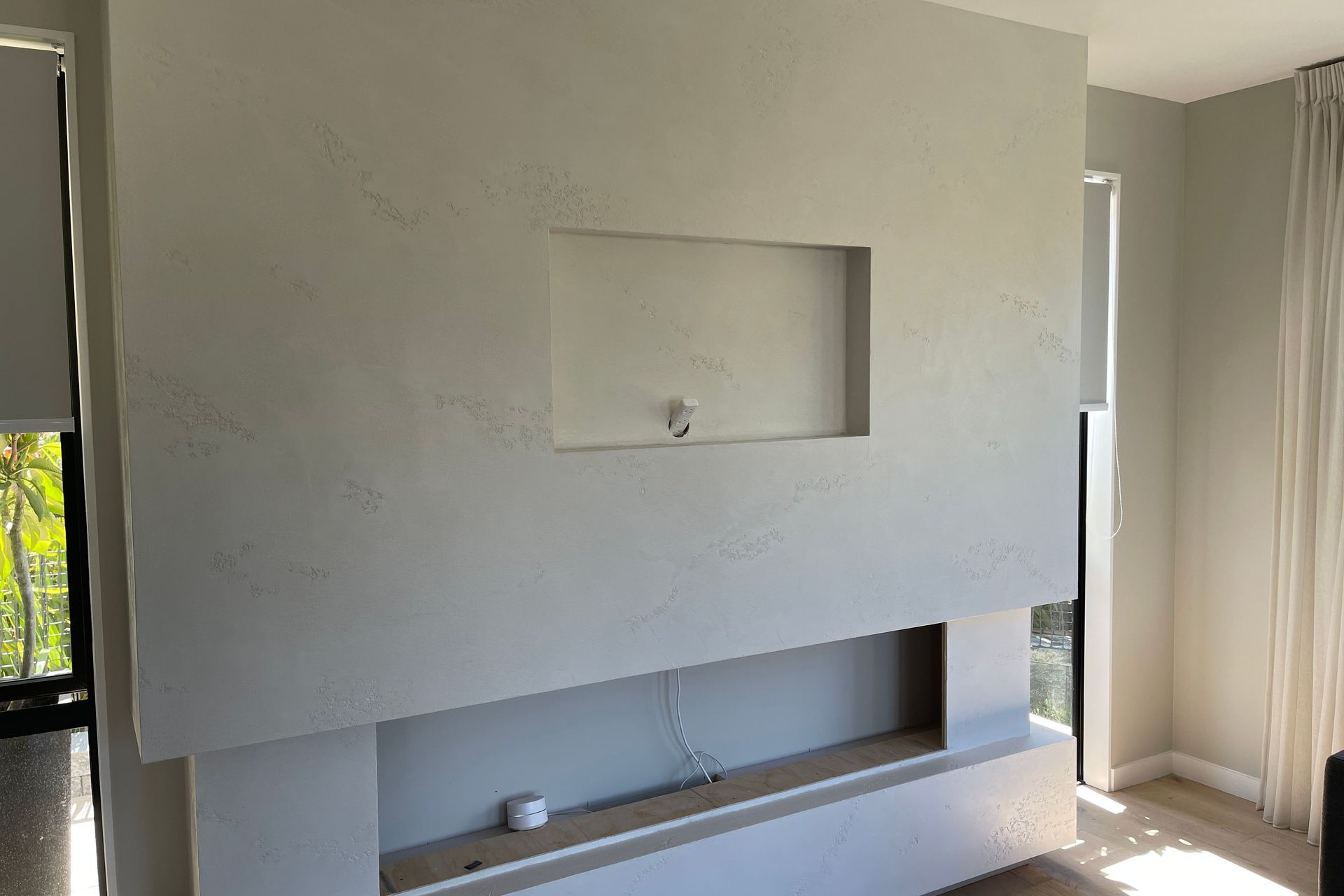 Resistone microcement fireplace