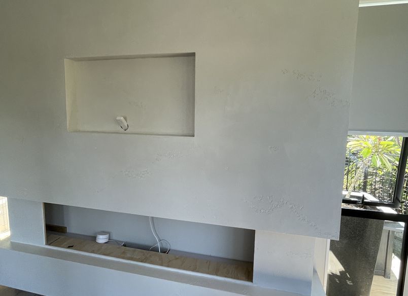 Resistone microcement fireplace