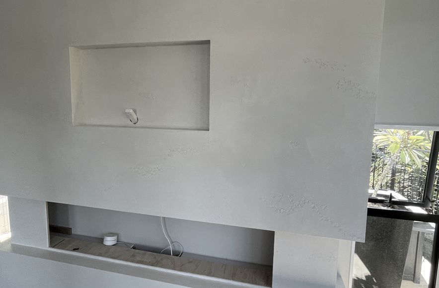 Resistone microcement fireplace