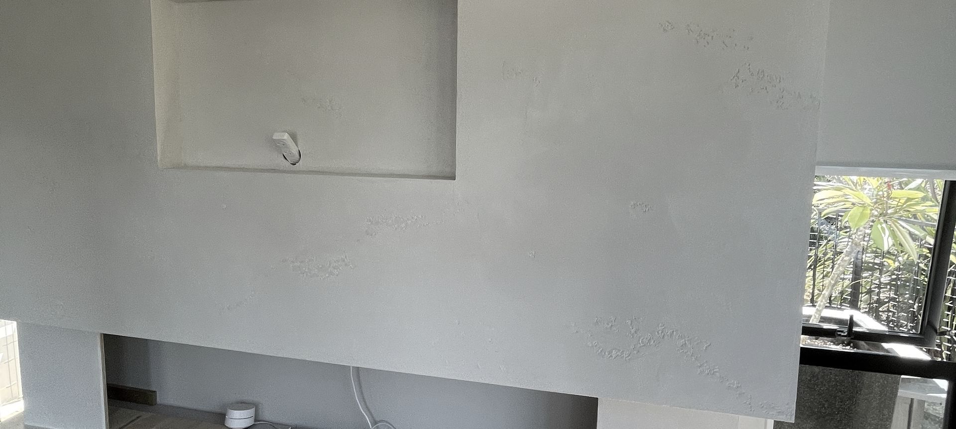 Resistone microcement fireplace banner