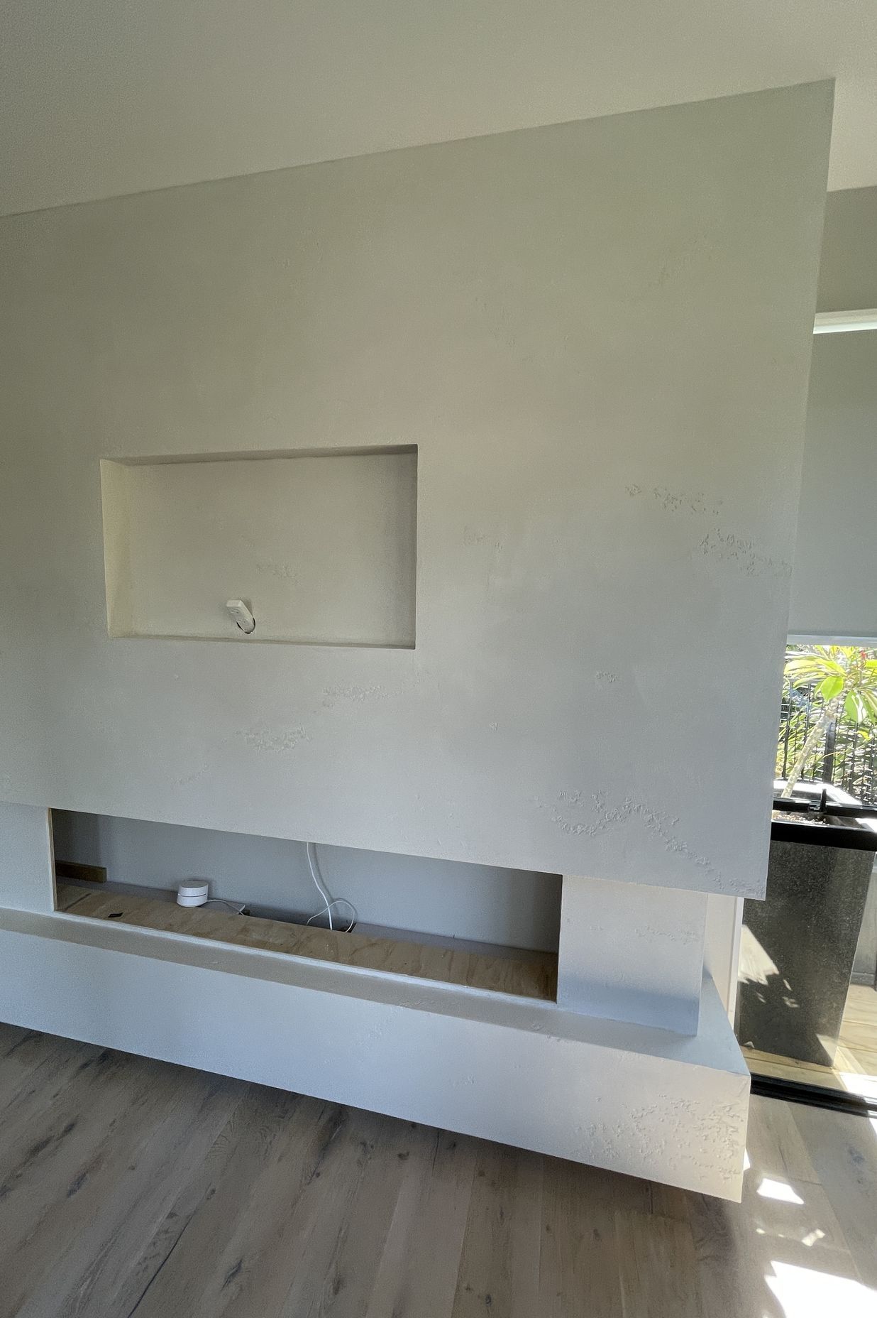 Resistone microcement fireplace