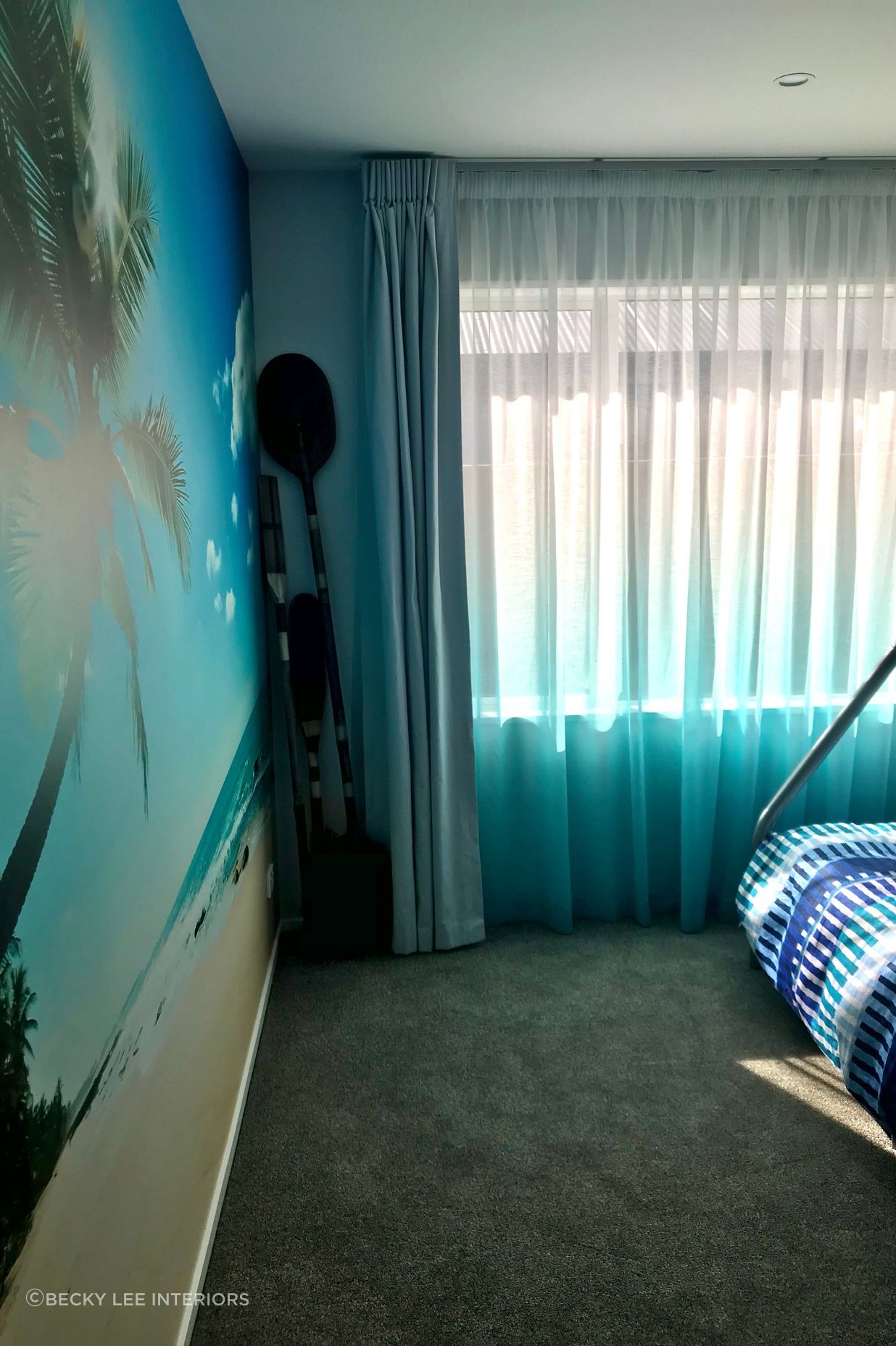 Boys bedroom... a double track system for the curtains with a dip dyed sheer doing the heavy lifting for privacy.