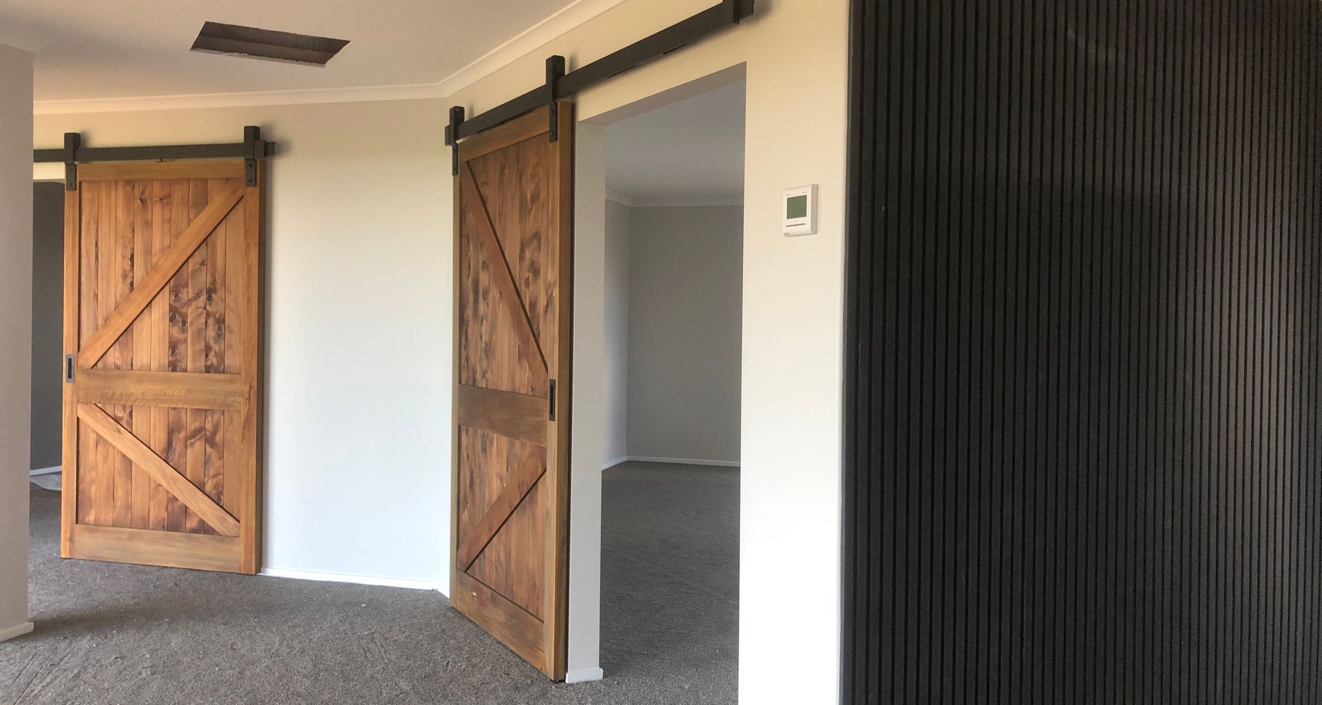 Beautiful Bespoke Macrocarpa Barn Doors banner
