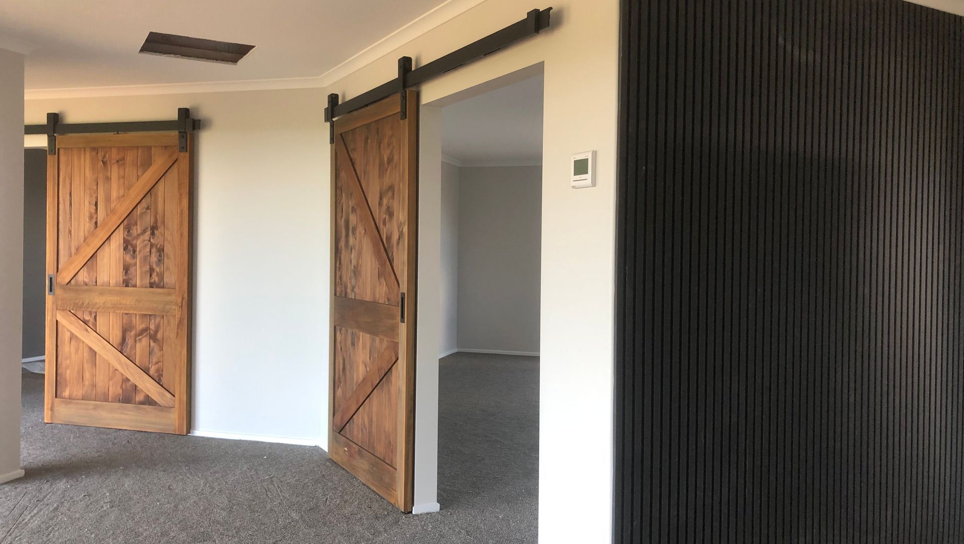 Beautiful Bespoke Macrocarpa Barn Doors banner