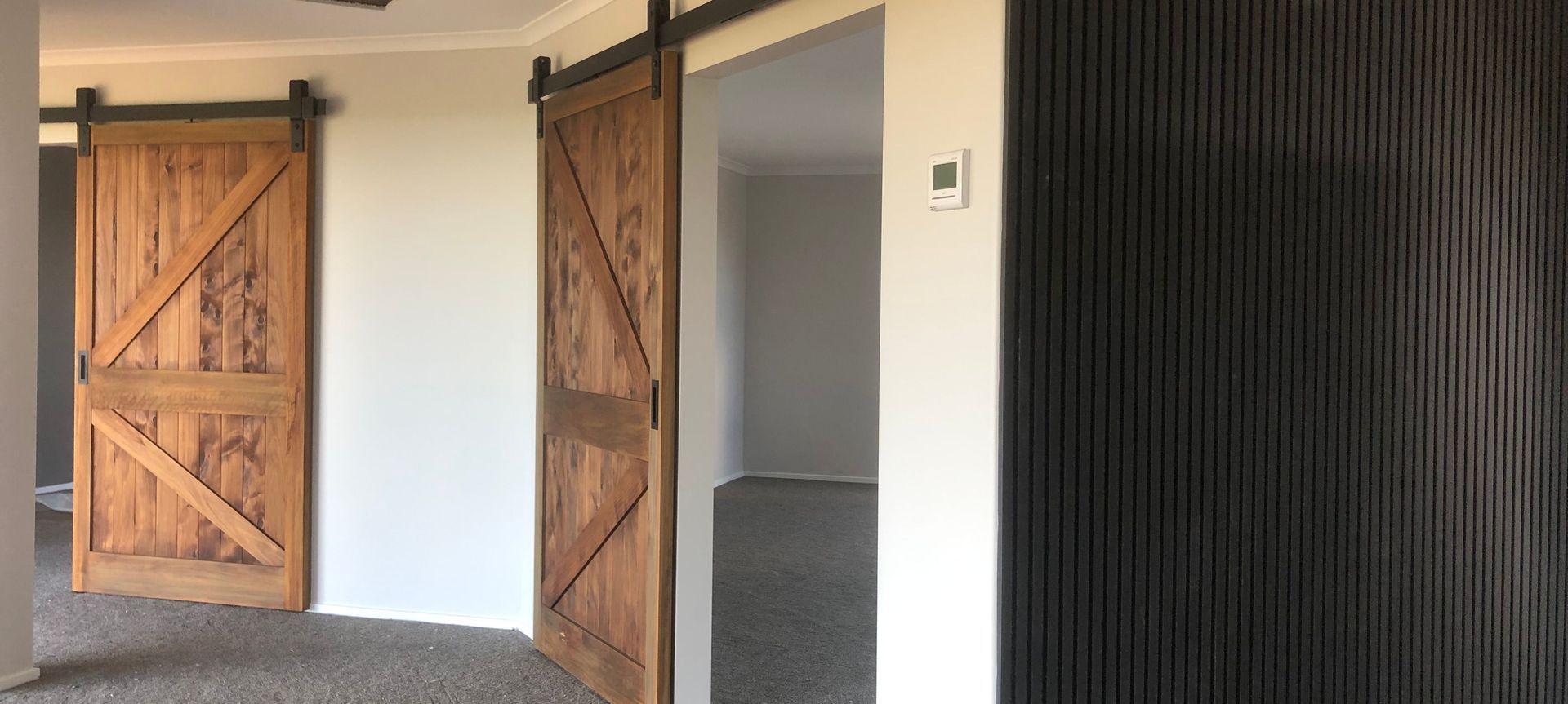 Beautiful Bespoke Macrocarpa Barn Doors banner
