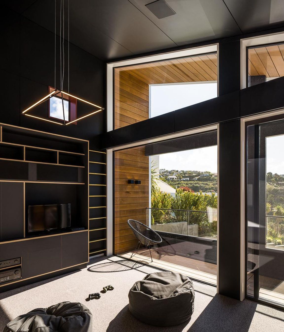 Discrete electrical work was concealed in a cavity behind the media room cabinetry.