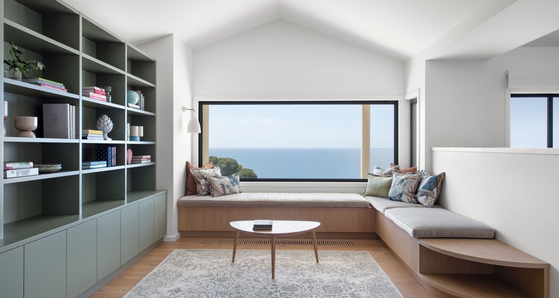 A library and relaxing space for a multi-generational beach house.