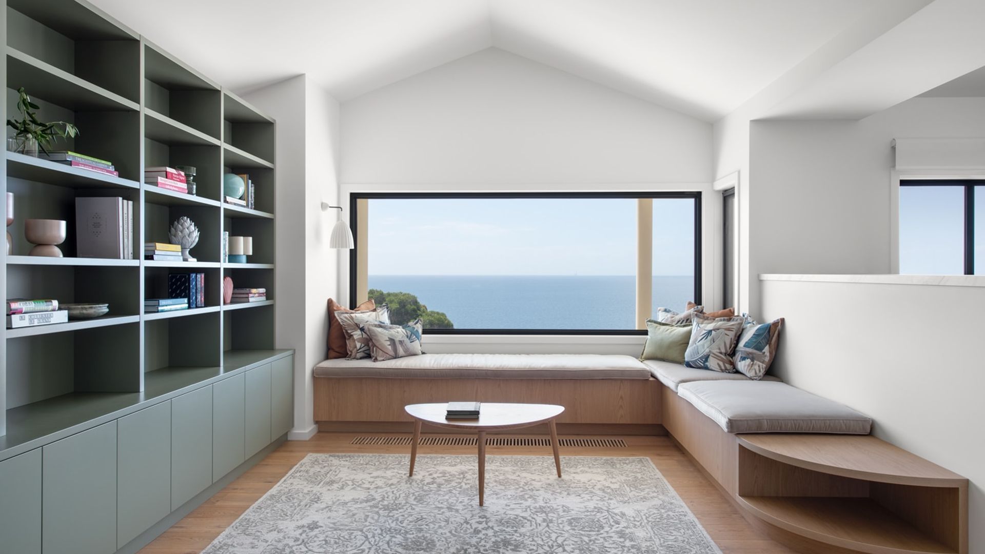A library and relaxing space for a multi-generational beach house.
