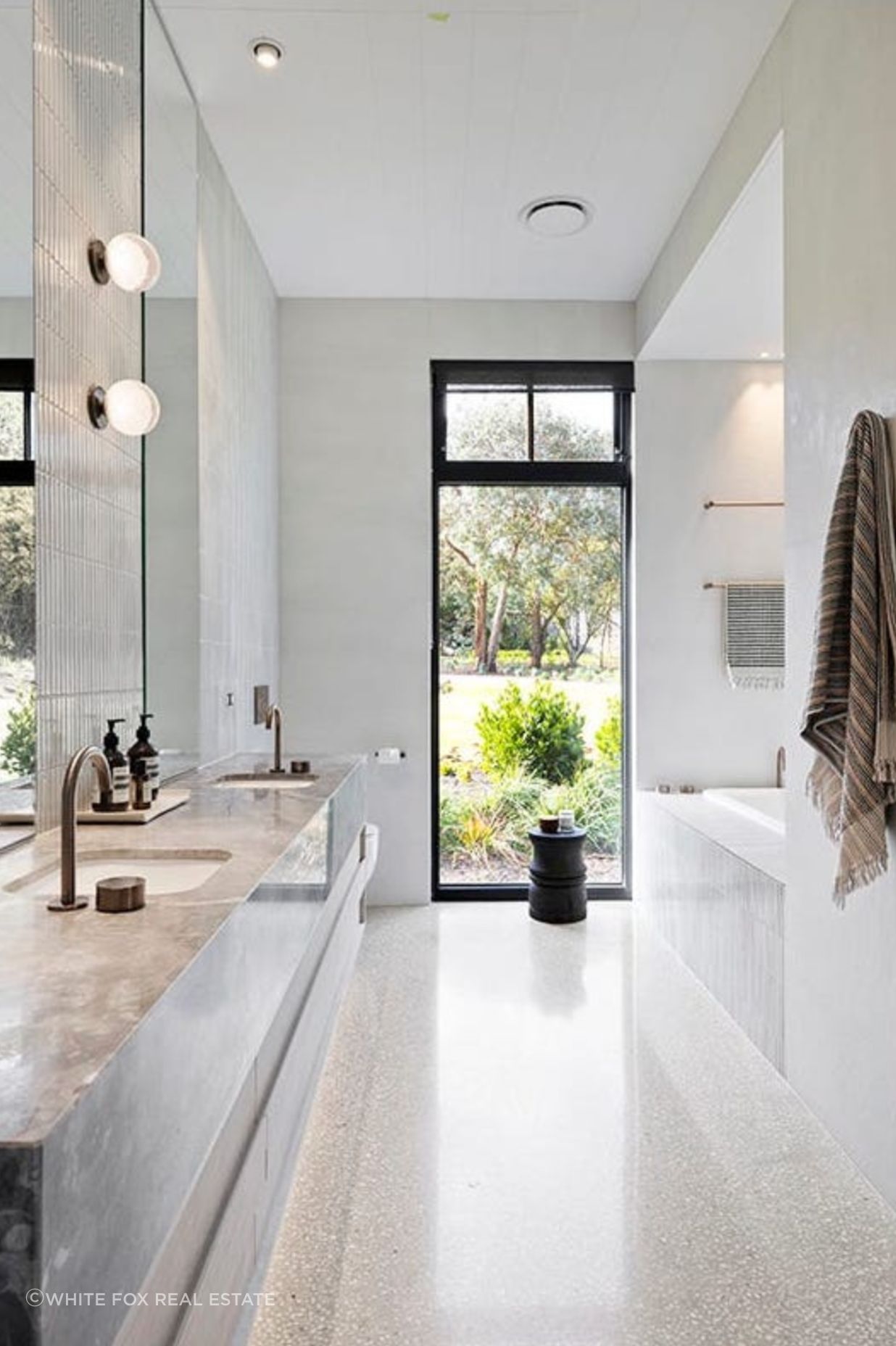 This luxurious bathroom is a sanctuary of relaxation, where every detail is meticulously designed for your utmost comfort