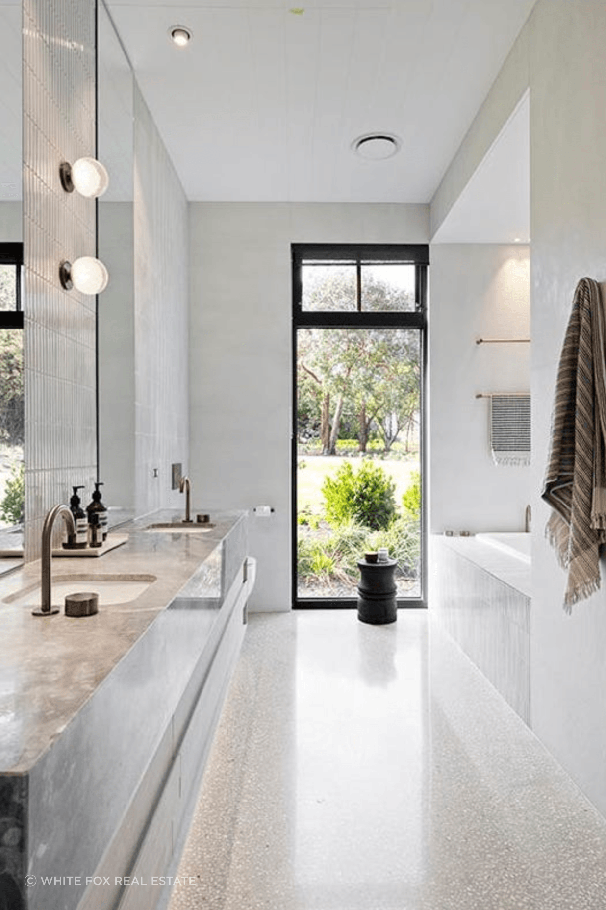 This luxurious bathroom is a sanctuary of relaxation, where every detail is meticulously designed for your utmost comfort