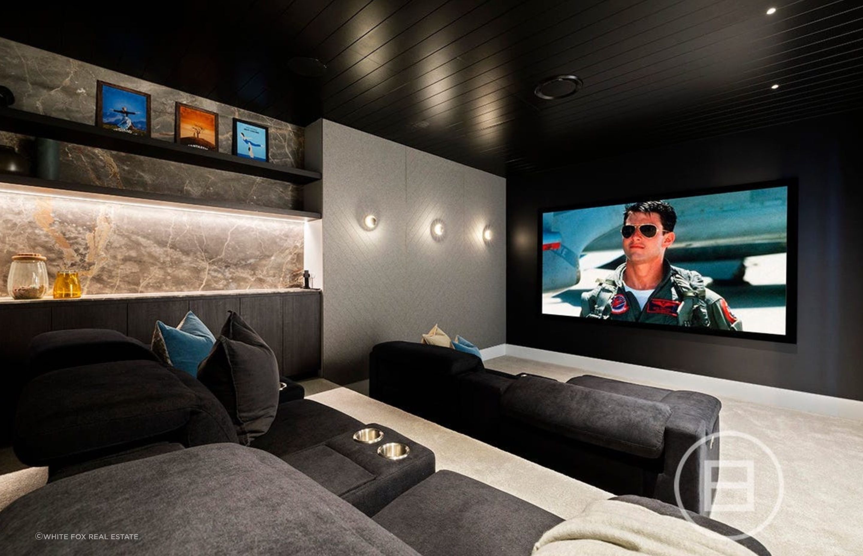 Allowing the family to immerse in the ultimate cinematic experience within this home state-of-the-art theater, where cutting-edge technology and luxurious comfort converge to transport to a world of captivating entertainment