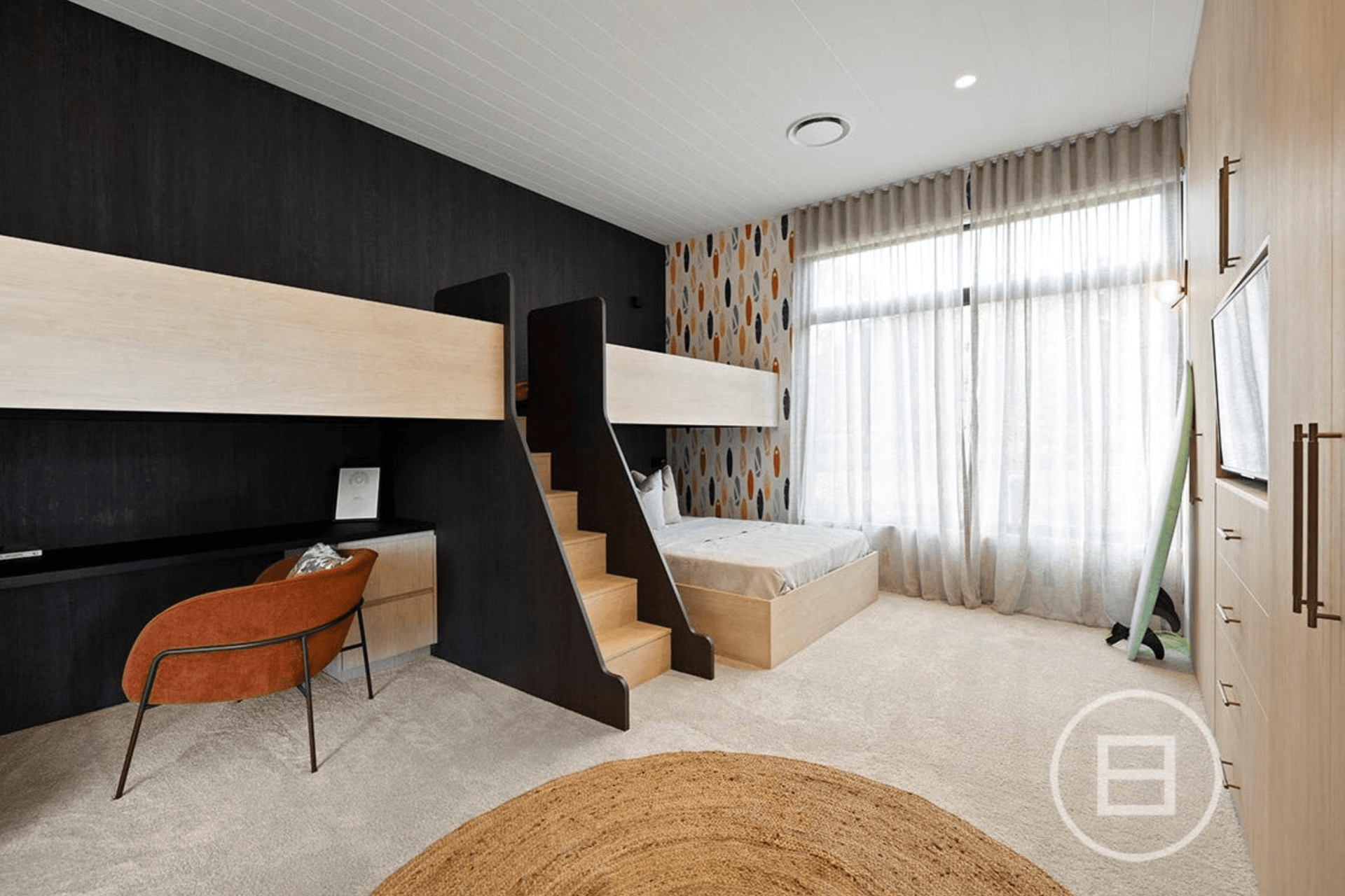 Creating a serene and tranquil space that fosters creativity and calmness, this children's bedroom features featuring minimalist tones and clean lines