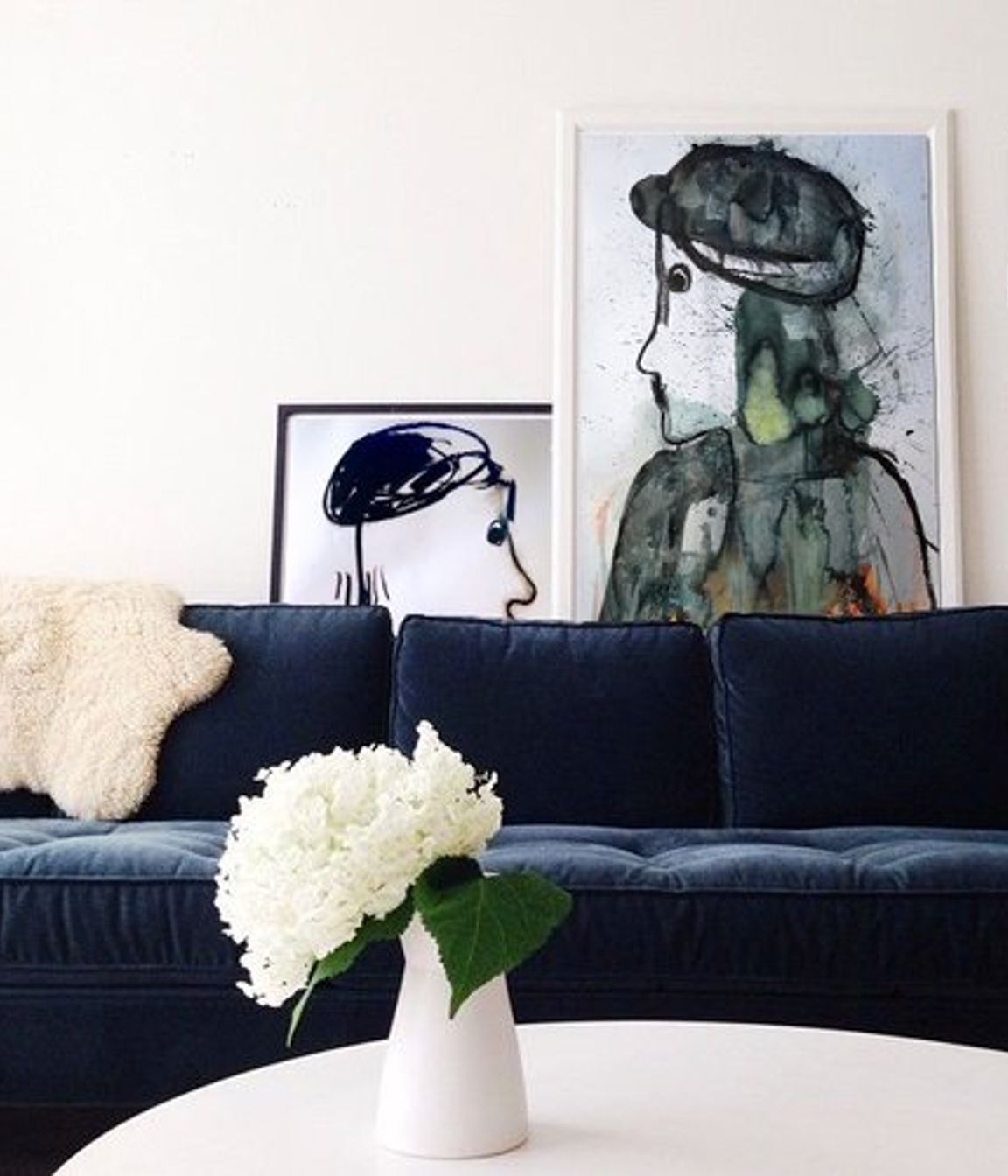 Cool but soft. Art can give the room an edge that's not easily forgotten. Lean it, hang it, whatever, have it!.