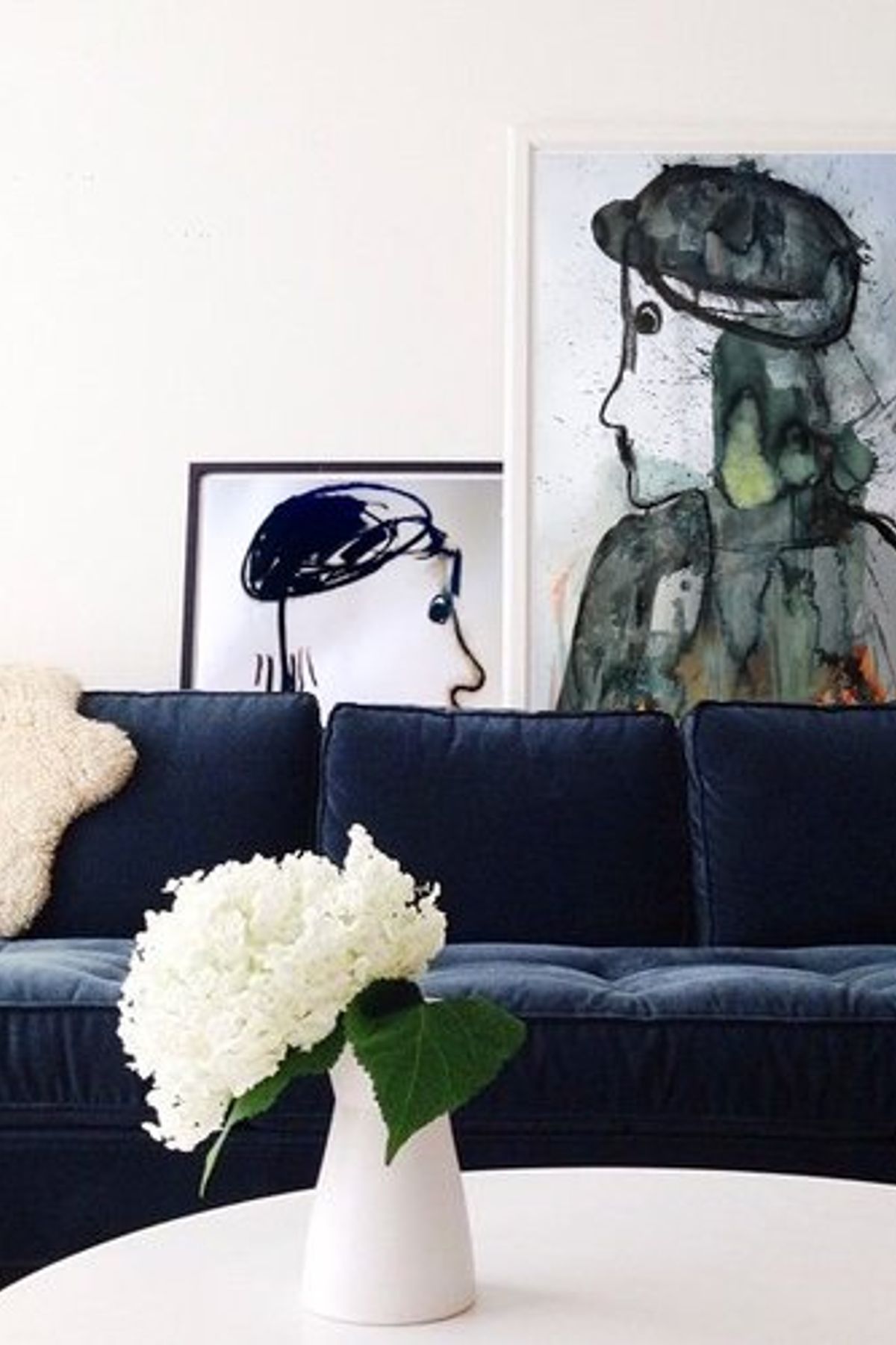 Cool but soft. Art can give the room an edge that's not easily forgotten. Lean it, hang it, whatever, have it!.