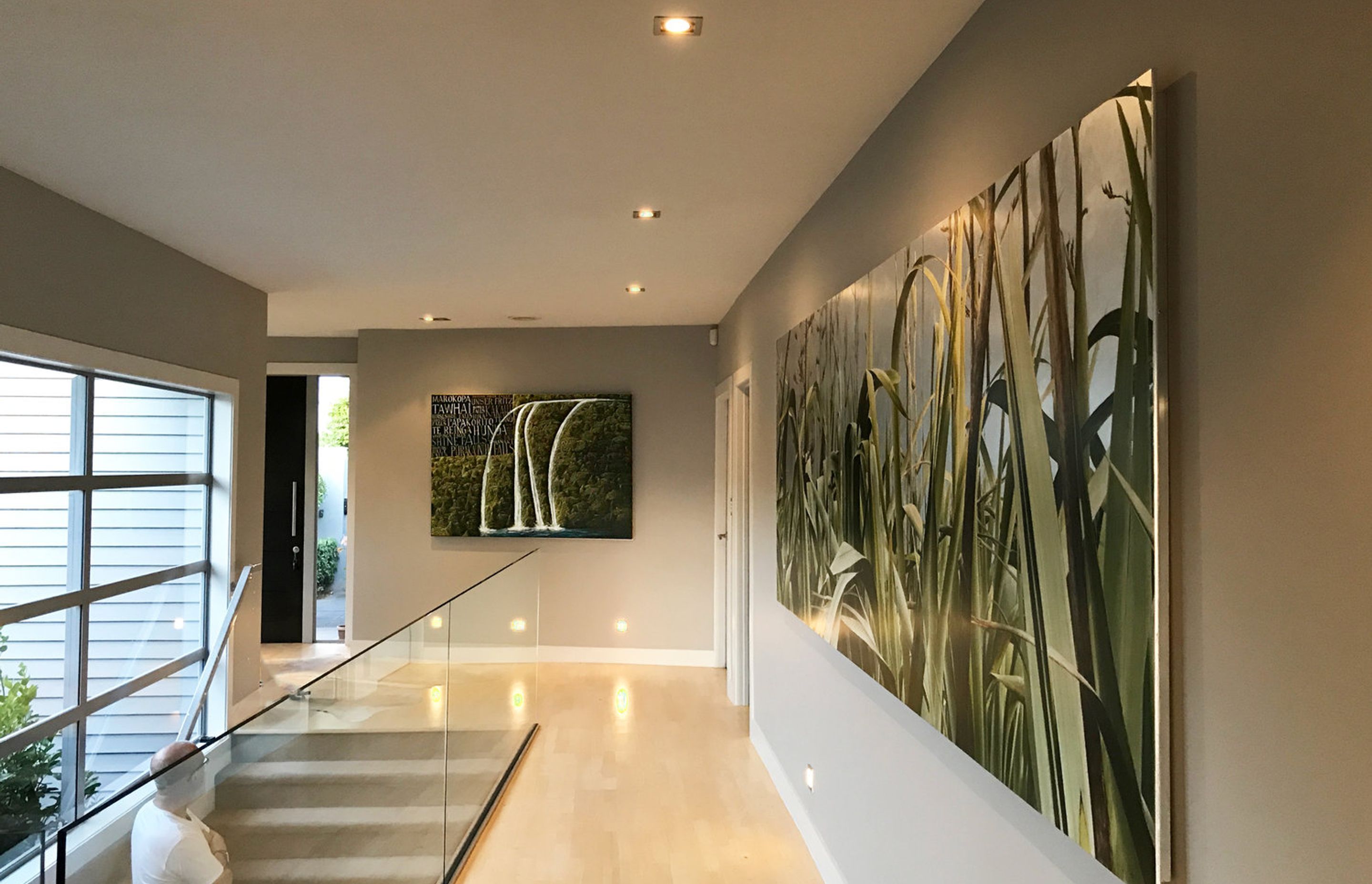 Chosen, off the shelf, or commissioned to complement, large or small, there's something out there to suit your space, taste and budget. Artworks by Mark Wooller, (left) and Neal Palmer. Private residence, Remuera, Auckland, New Zealand.