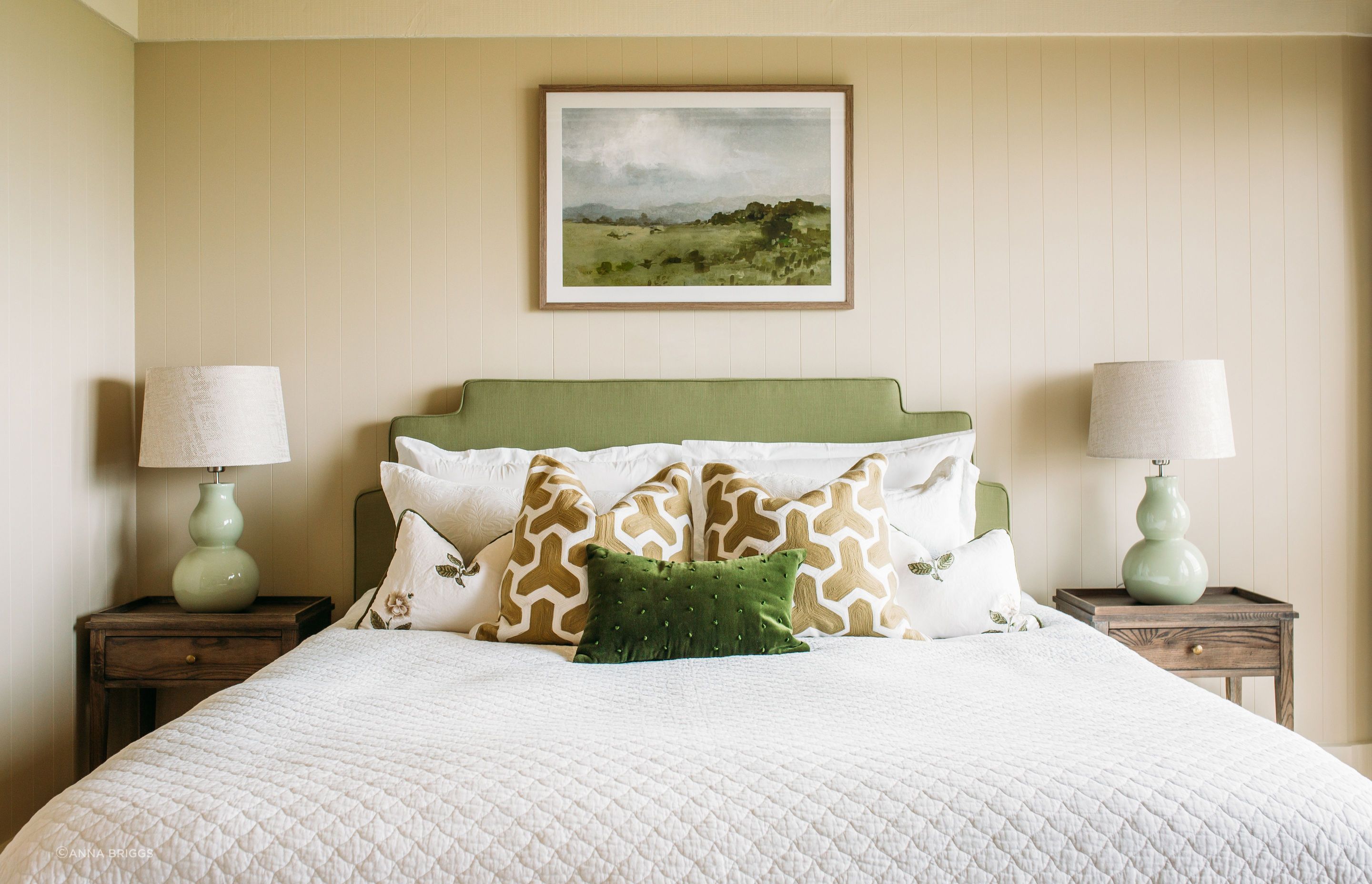 A bedroom in Foley Villa. The bedside lamps are by Eunice Taylor.