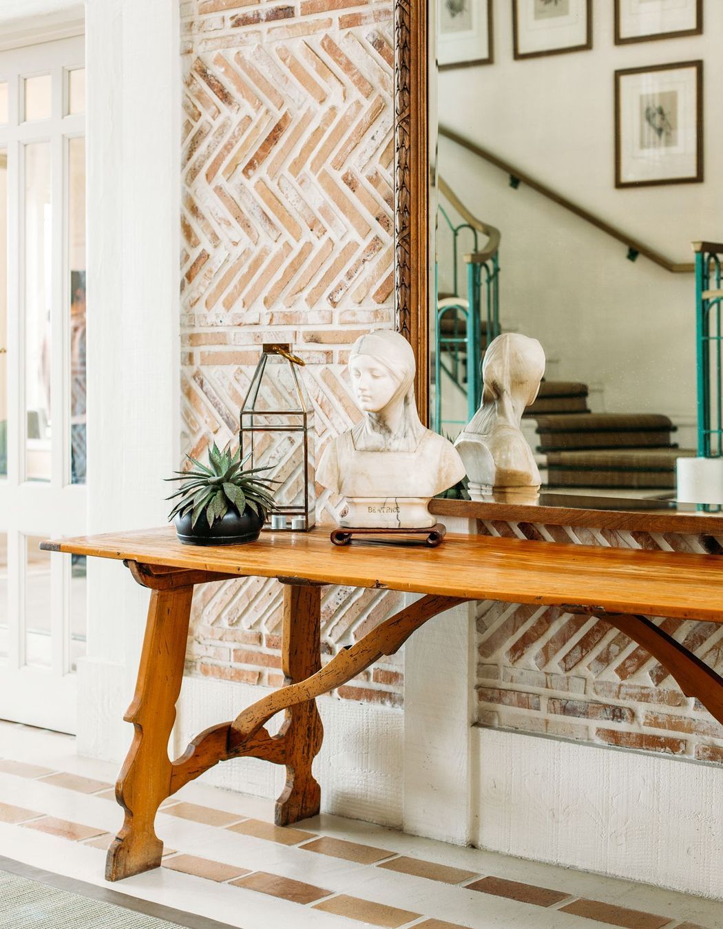 The lodge was built much later than the main farmstead’s 1800s origins but retains the old-world charm. “We've created thoughtful vignettes using antique pieces, furniture and art to provide visual moments of pause throughout,” says Nikki.