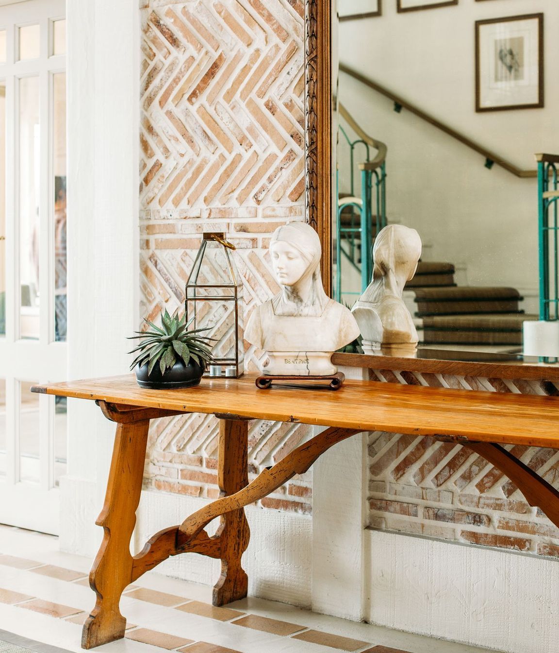 The lodge was built much later than the main farmstead’s 1800s origins but retains the old-world charm. “We've created thoughtful vignettes using antique pieces, furniture and art to provide visual moments of pause throughout,” says Nikki.