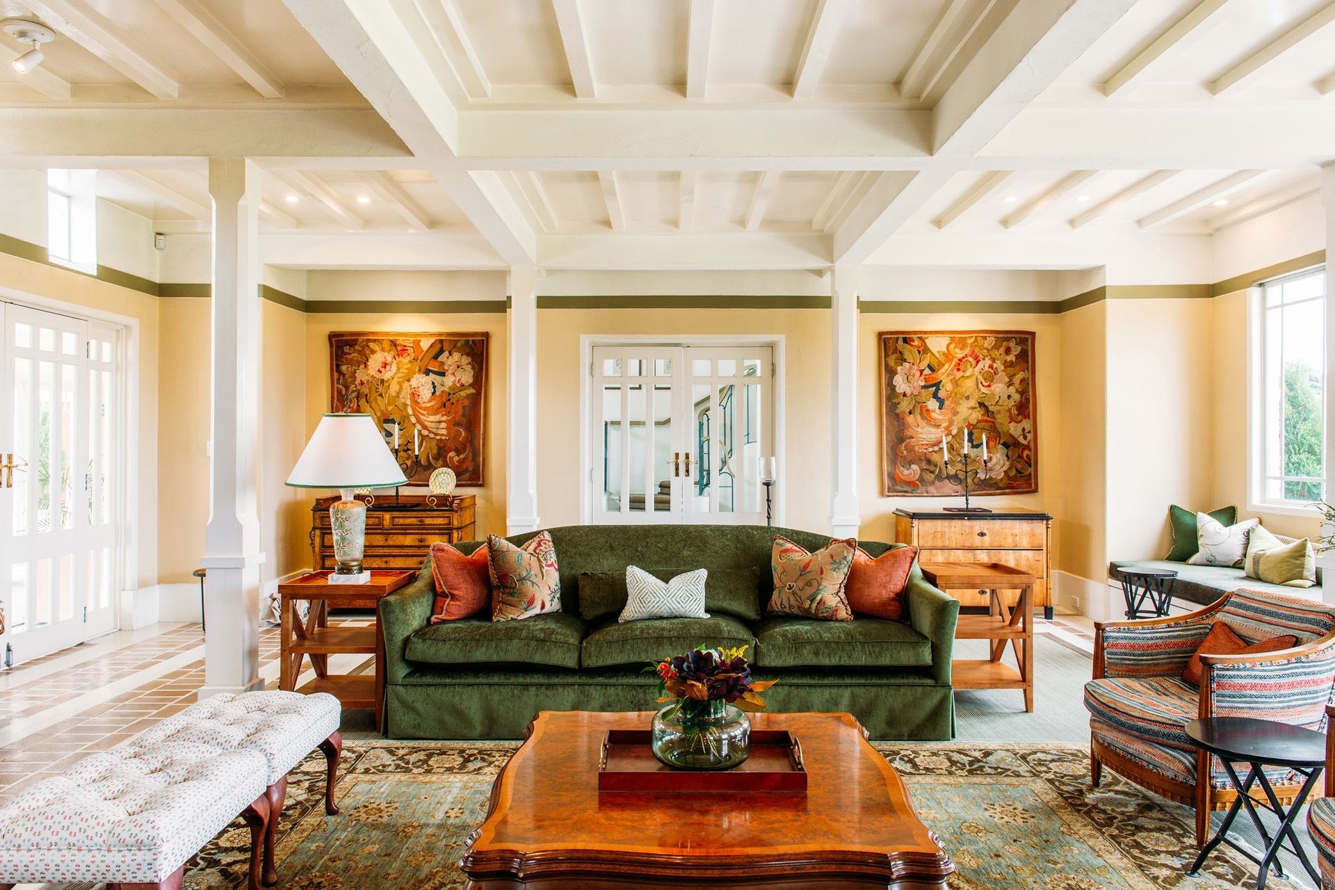 The sofas in the main living room are by Profile Furniture. Fabrics were key to Kurio’s design and they were careful to use hardwearing fabrics such as velvet and wool on high-use items such as sofas while saving more delicate embroidered materials and trims for accessories and occasional furniture. The team went to fabric houses such as Seneca, Textilia, James Dunlop Textiles, Icon Radford and Atelier Textiles to source the perfect fabrics to build their palettes.