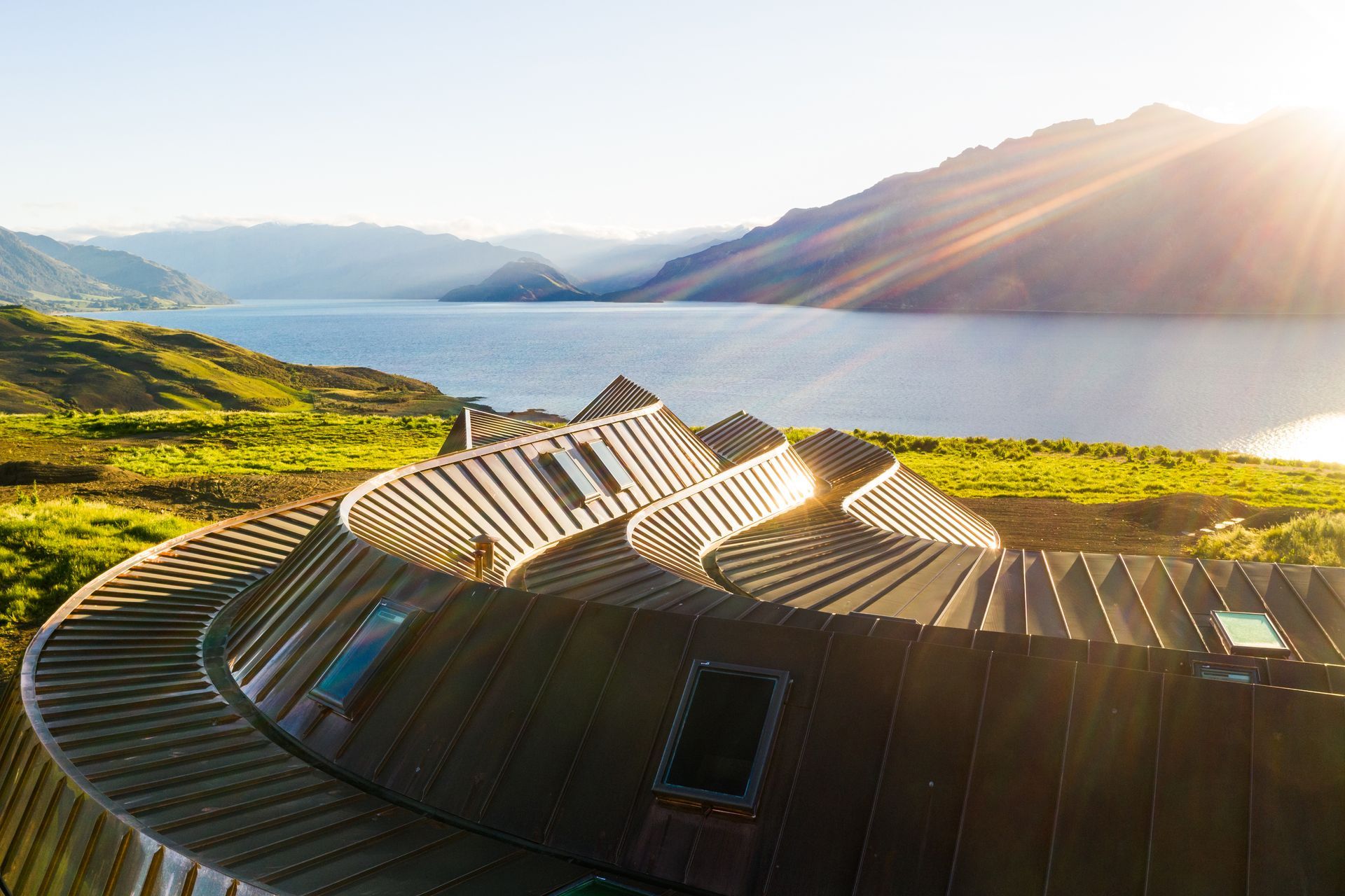 Natural copper was chosen for the roof for its malleability but also for its striking colour when lit by the afternoon sun.
