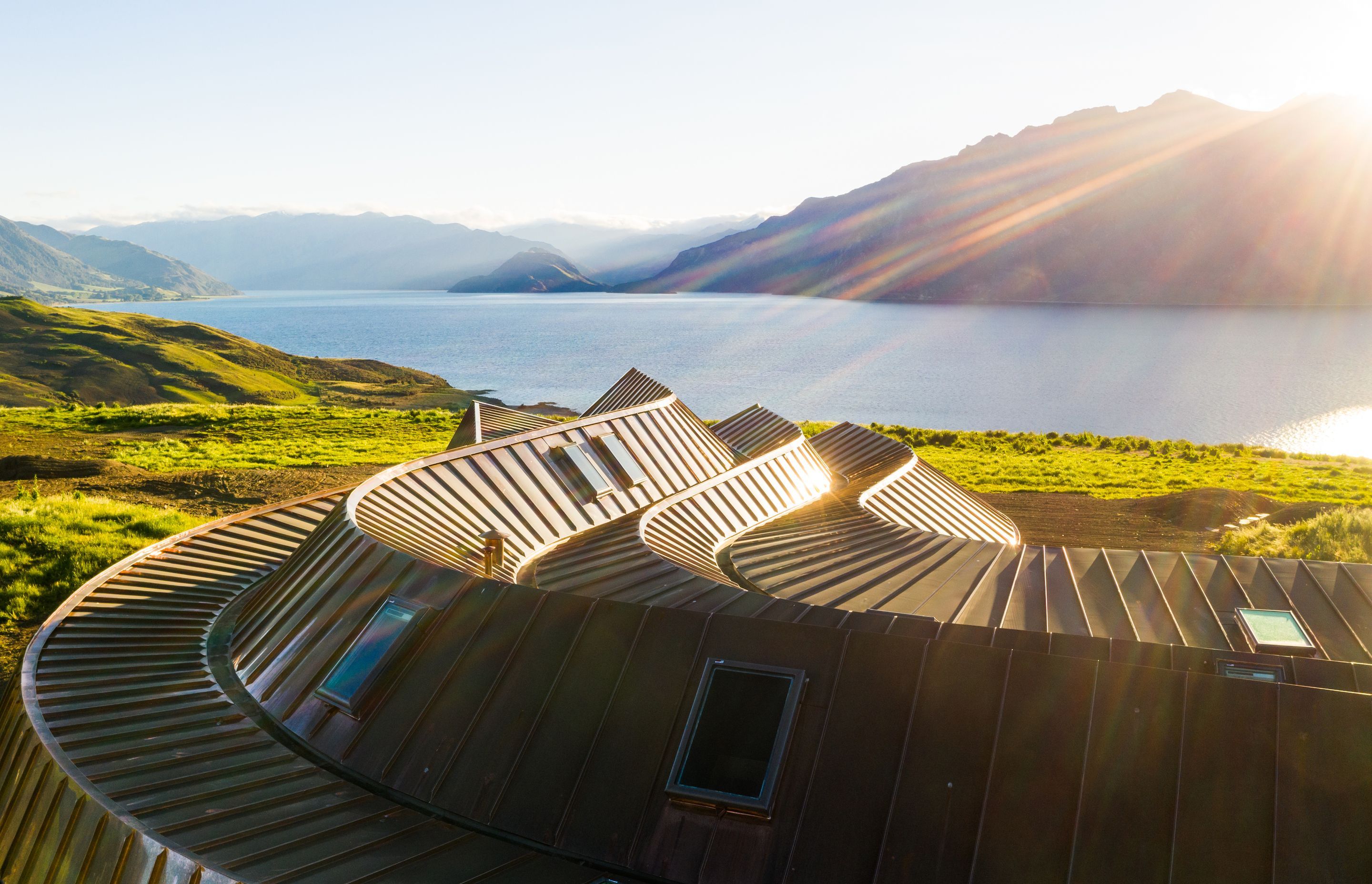 Natural copper was chosen for the roof for its malleability but also for its striking colour when lit by the afternoon sun.