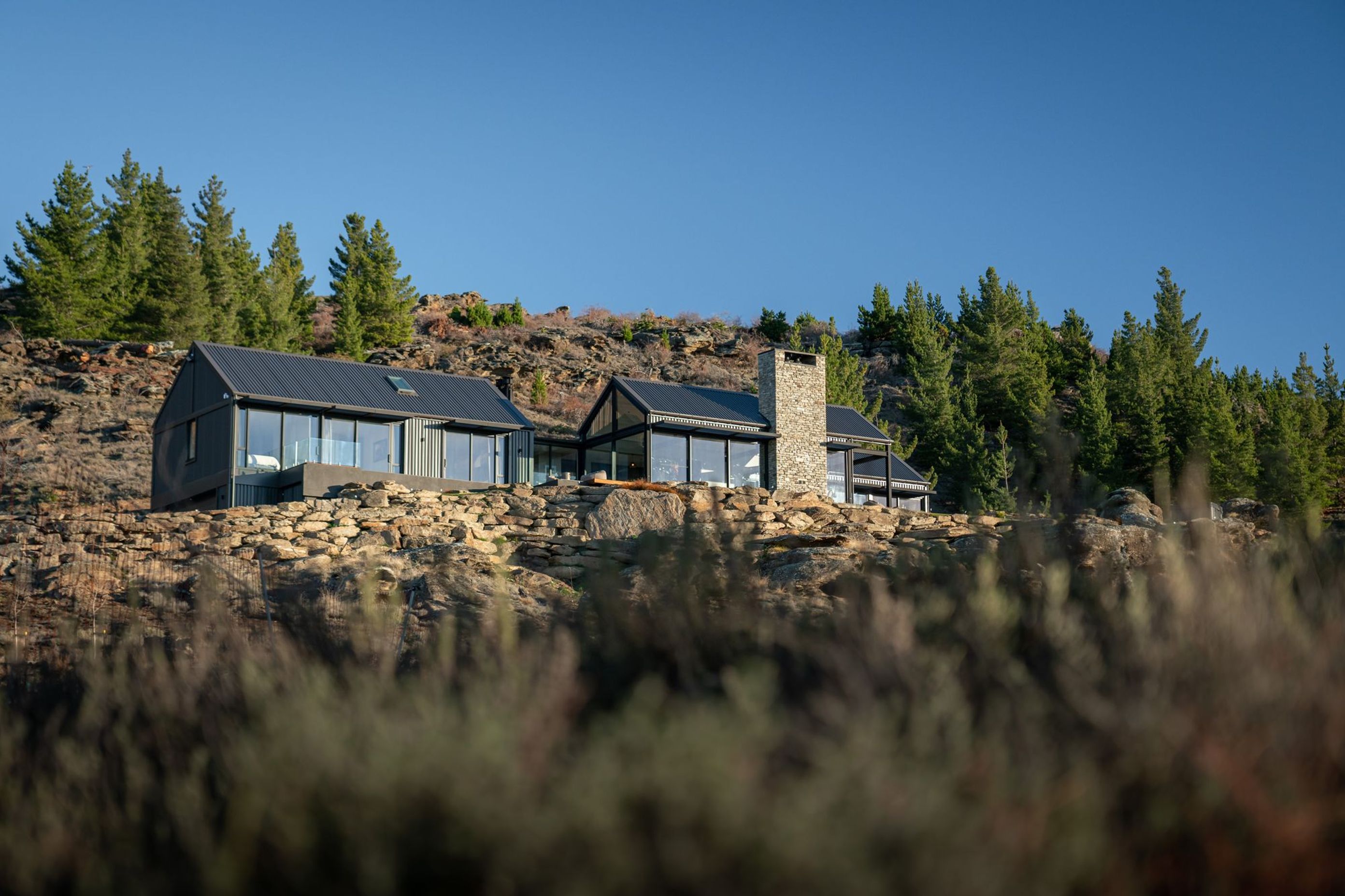A limited palette of robust, low maintenance materials was selected to clad the exterior of the building including exposed structural steel, reverse-run profiled metal cladding, hardwood decking and large expanses of glass.