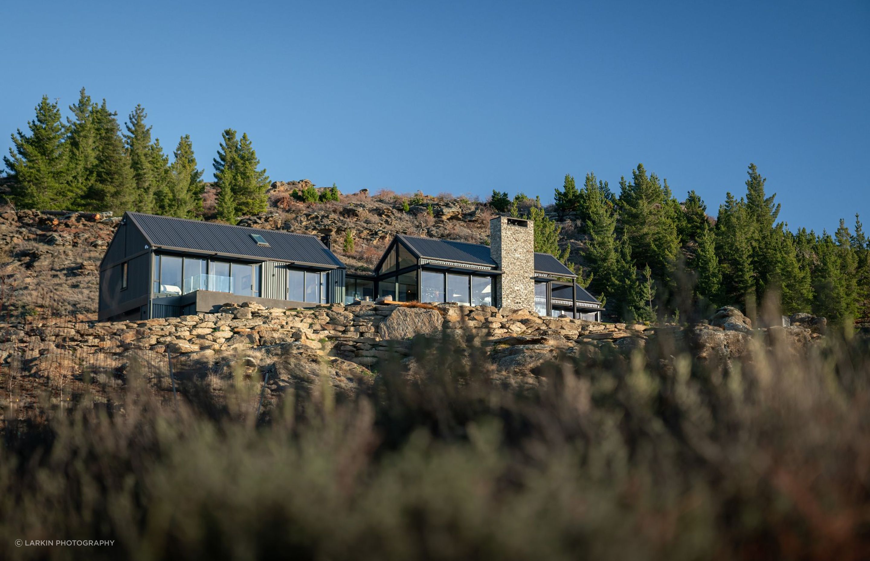 A limited palette of robust, low maintenance materials was selected to clad the exterior of the building including exposed structural steel, reverse-run profiled metal cladding, hardwood decking and large expanses of glass.