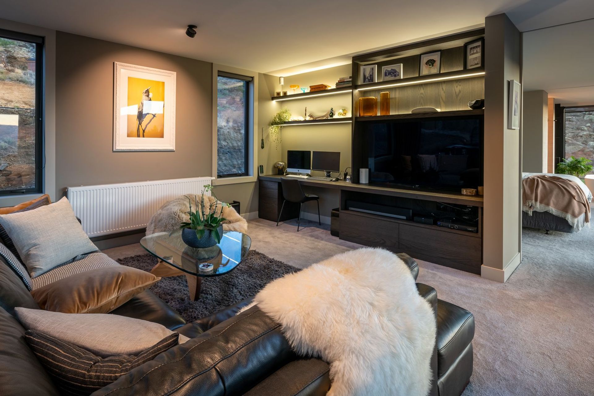 A media room adjacent to the master suite is a flexible space for family to watch movies, or to use as a home office during the day.