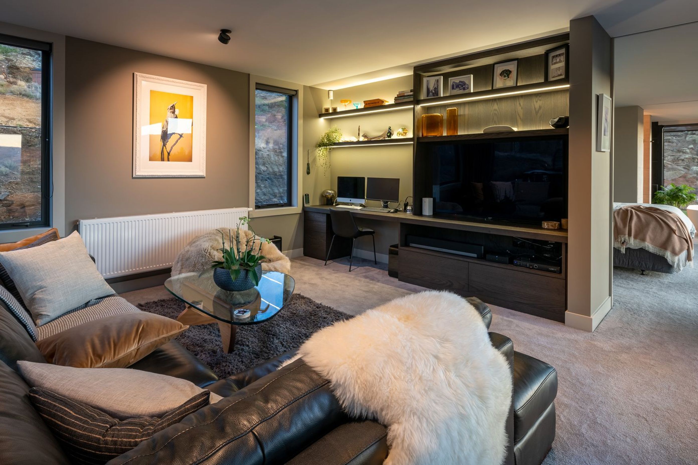 A media room adjacent to the master suite is a flexible space for family to watch movies, or to use as a home office during the day.
