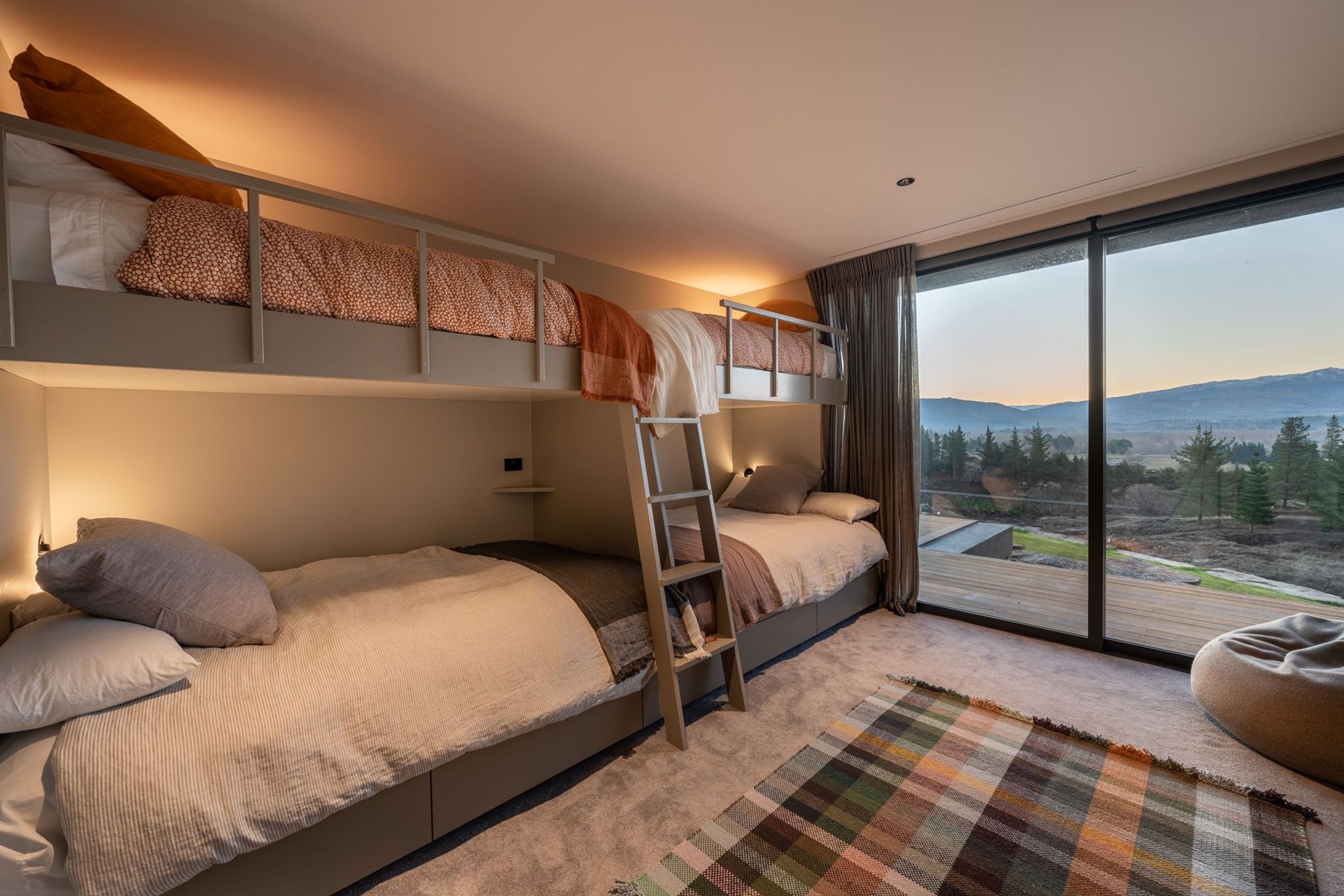 In the guest/family wing, a sumptuous bunkroom is perfect for the kids to pile into.