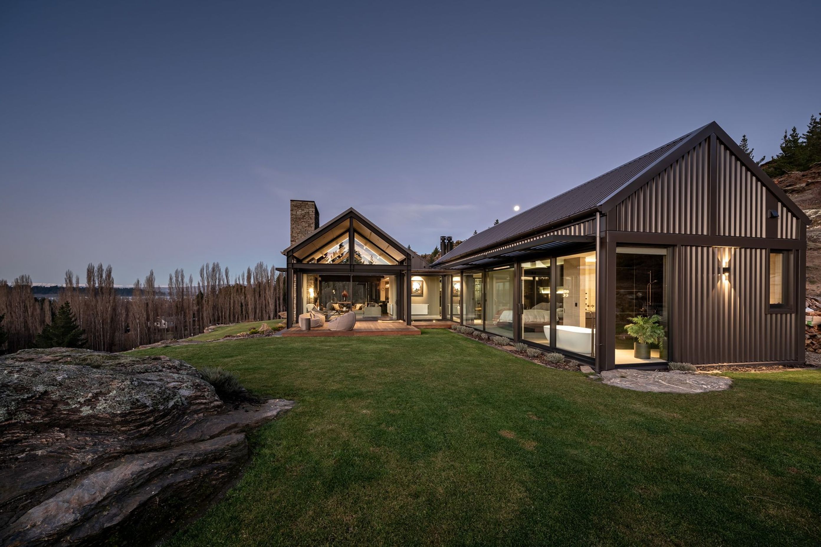 The three gable forms feature large expanses of glazing so that each space takes in the view.