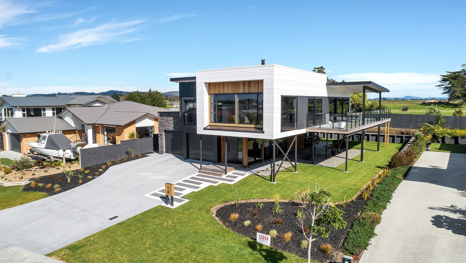 Marsden Cove- Northland- Luxury / Beach House / Outdoor Living / New Build by Cogan Custom Homes banner