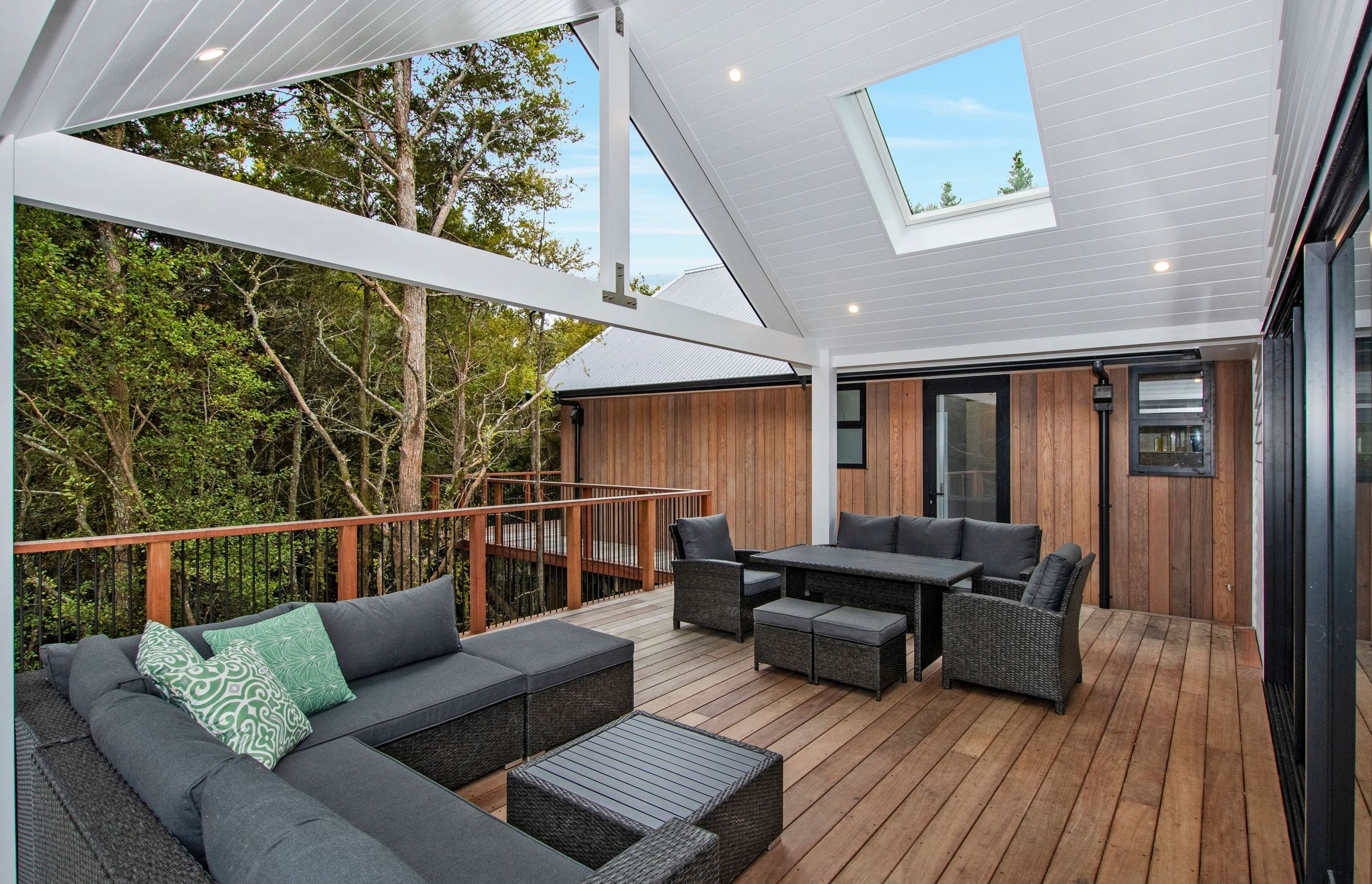 Outdoor seating area with T&amp;G roof and hardwood decking