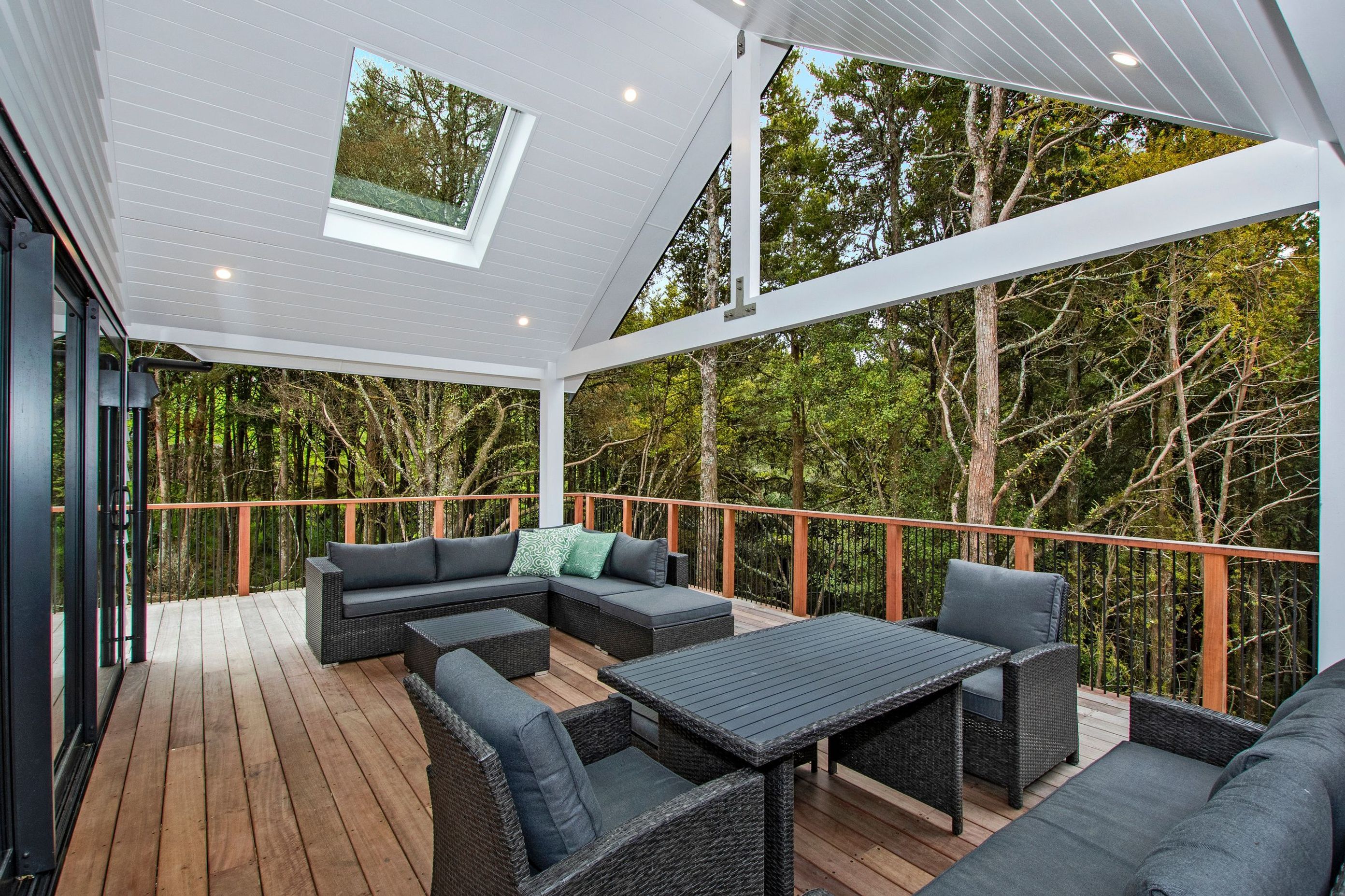 Outdoor seating area with T&amp;G roof and hardwood decking
