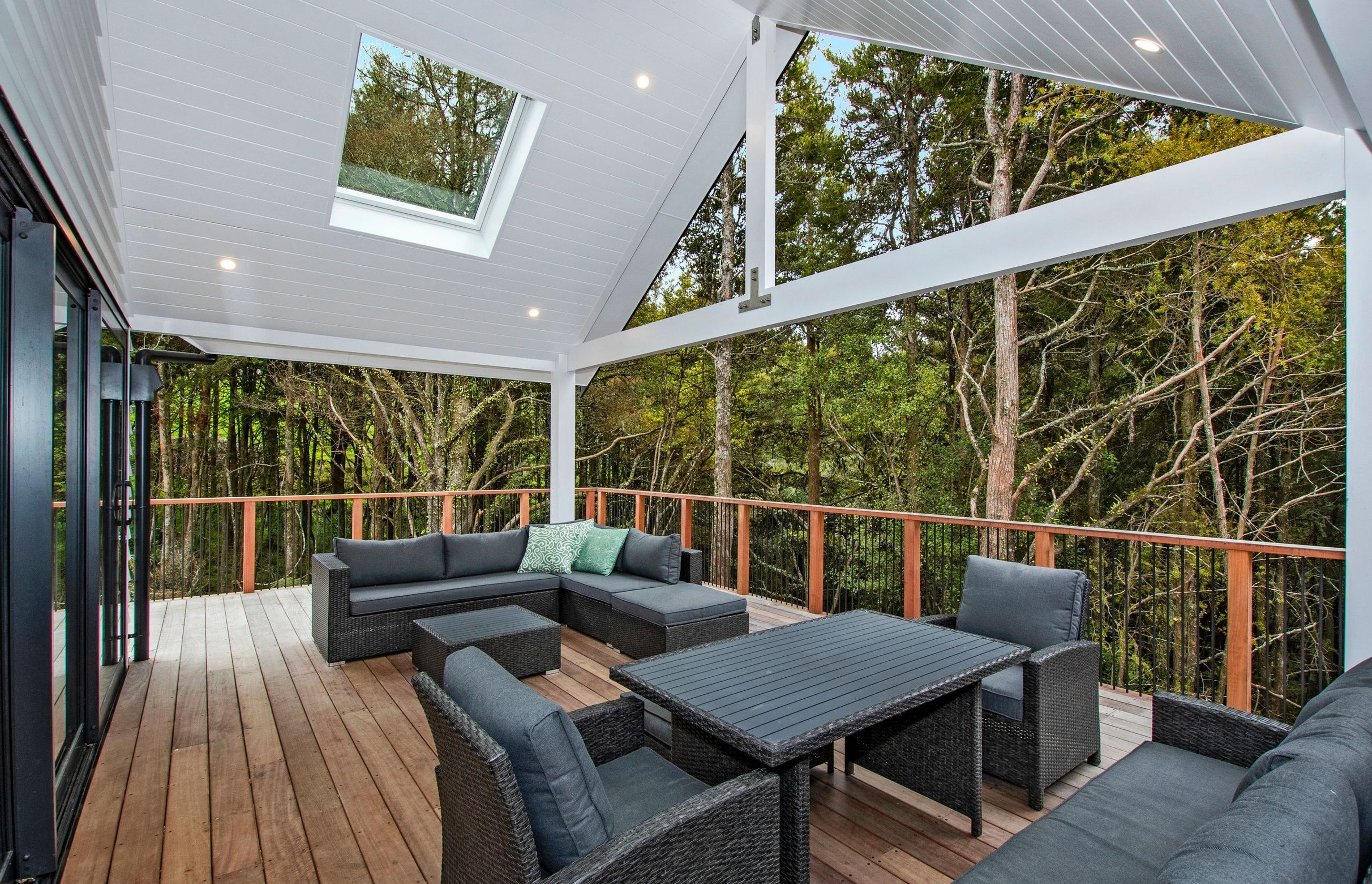Outdoor seating area with T&G roof and hardwood decking