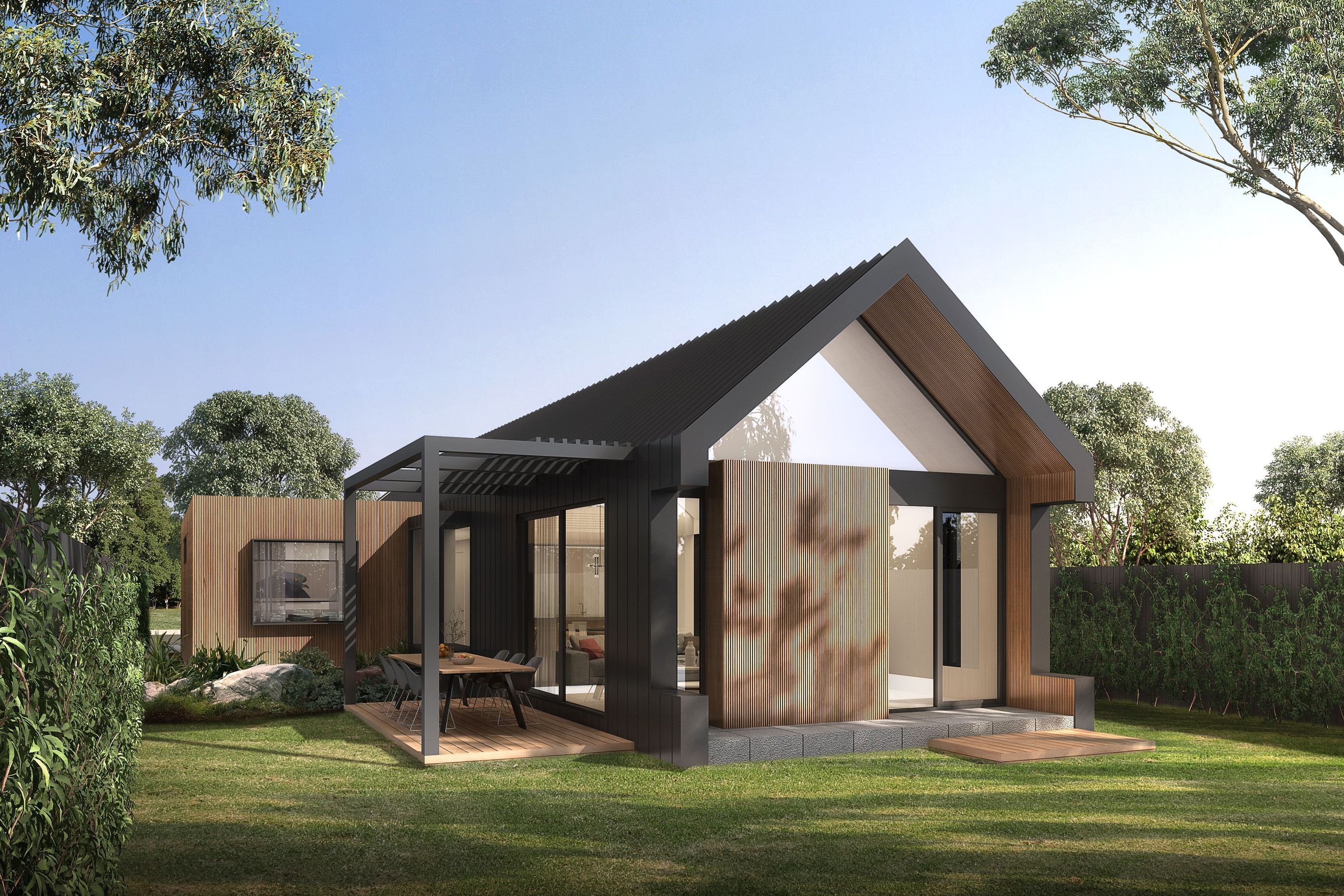 Interiors spill out into the backyard via raised decking, where afternoons can be spent in dappled sunlight beneath timber awnings, and balmy evenings can be enjoyed dining and entertaining outdoors.