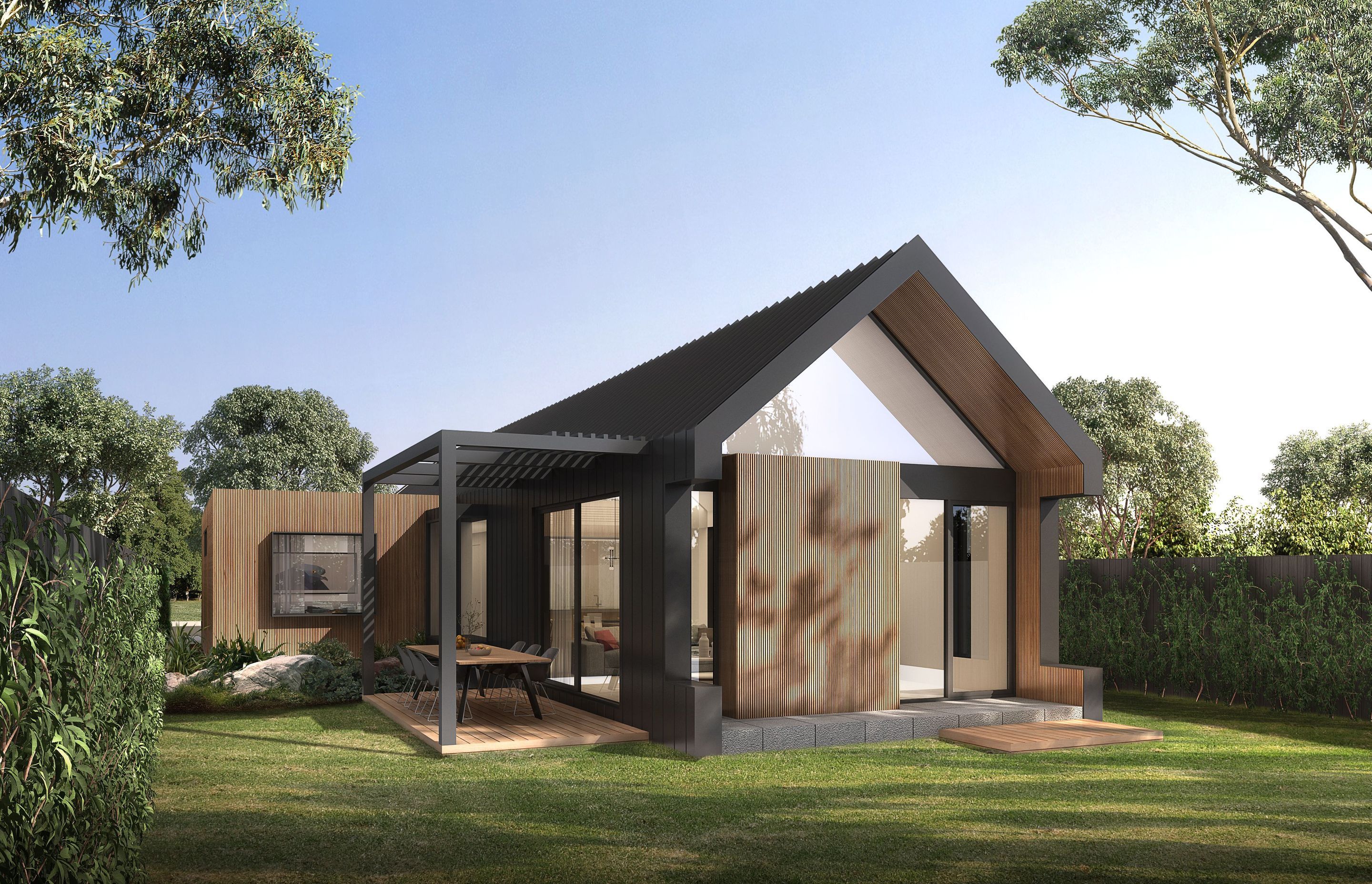 Interiors spill out into the backyard via raised decking, where afternoons can be spent in dappled sunlight beneath timber awnings, and balmy evenings can be enjoyed dining and entertaining outdoors.