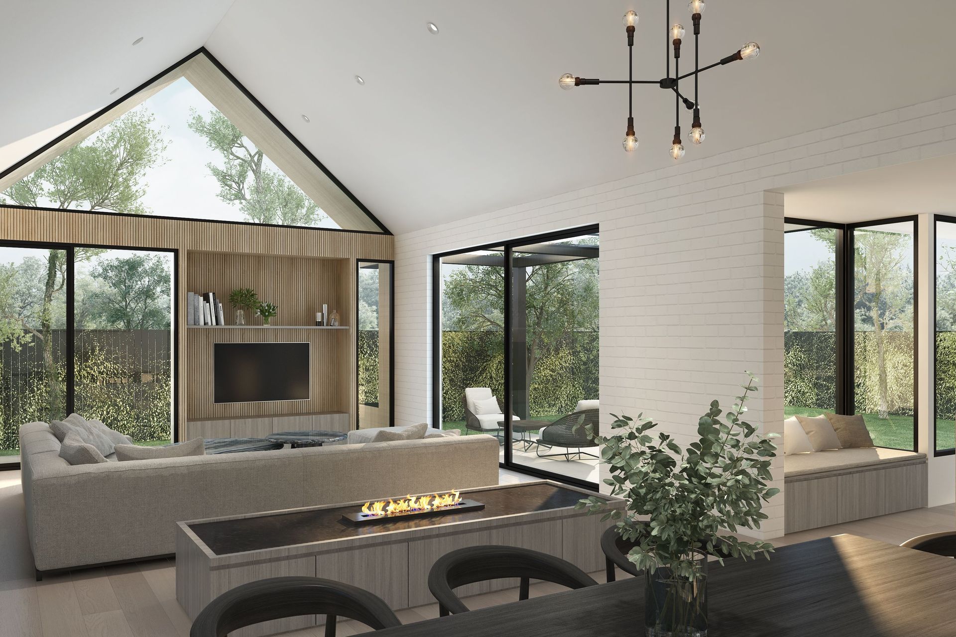 Bright, expansive and flanked by large windows, the two living areas are designed with flexible layouts to suit the dynamic needs of occupants. The central, sloping roof creates a soaring sense of volume and invites ample sunlight into the central living space below