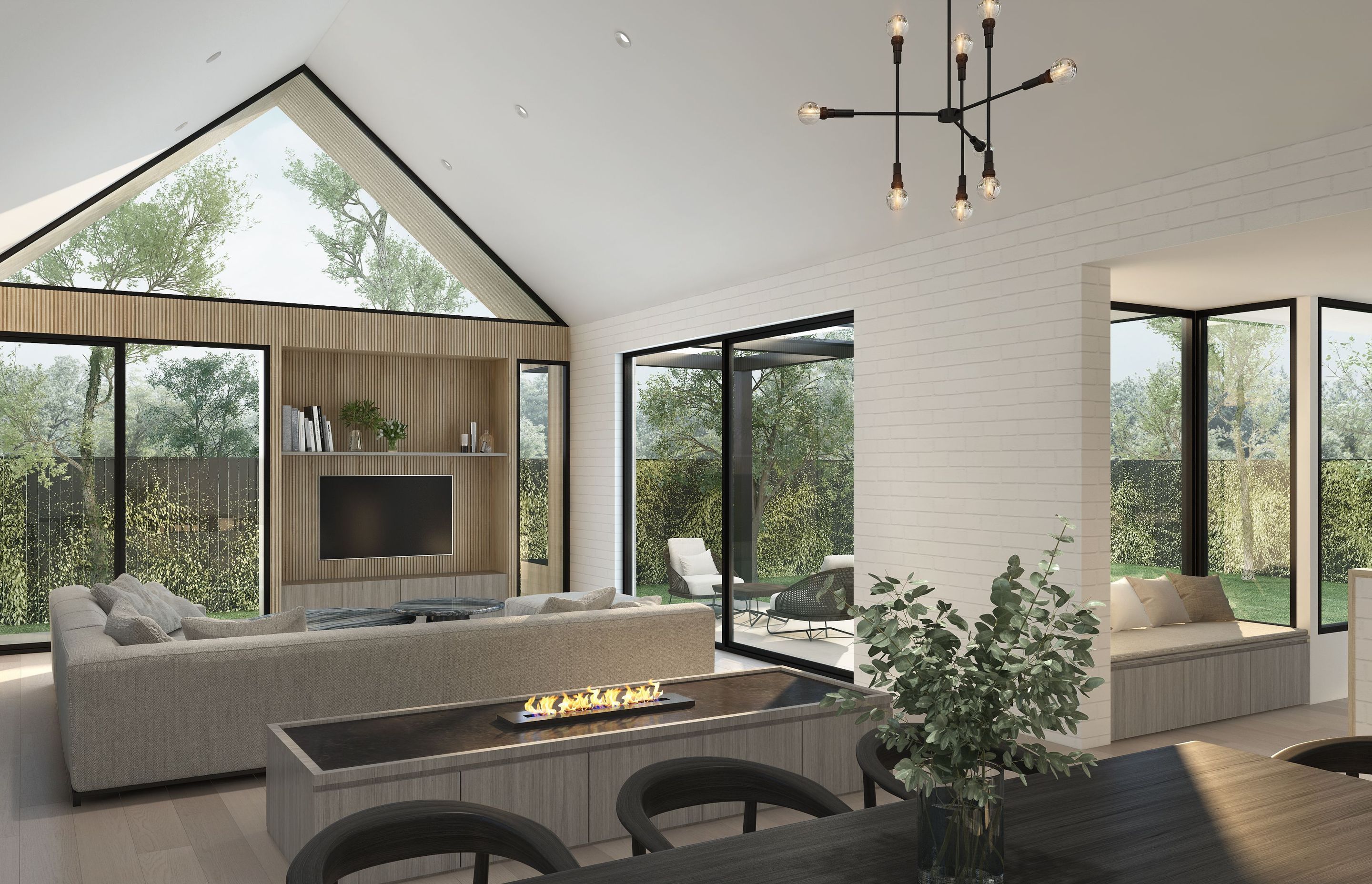 Bright, expansive and flanked by large windows, the two living areas are designed with flexible layouts to suit the dynamic needs of occupants. The central, sloping roof creates a soaring sense of volume and invites ample sunlight into the central living space below