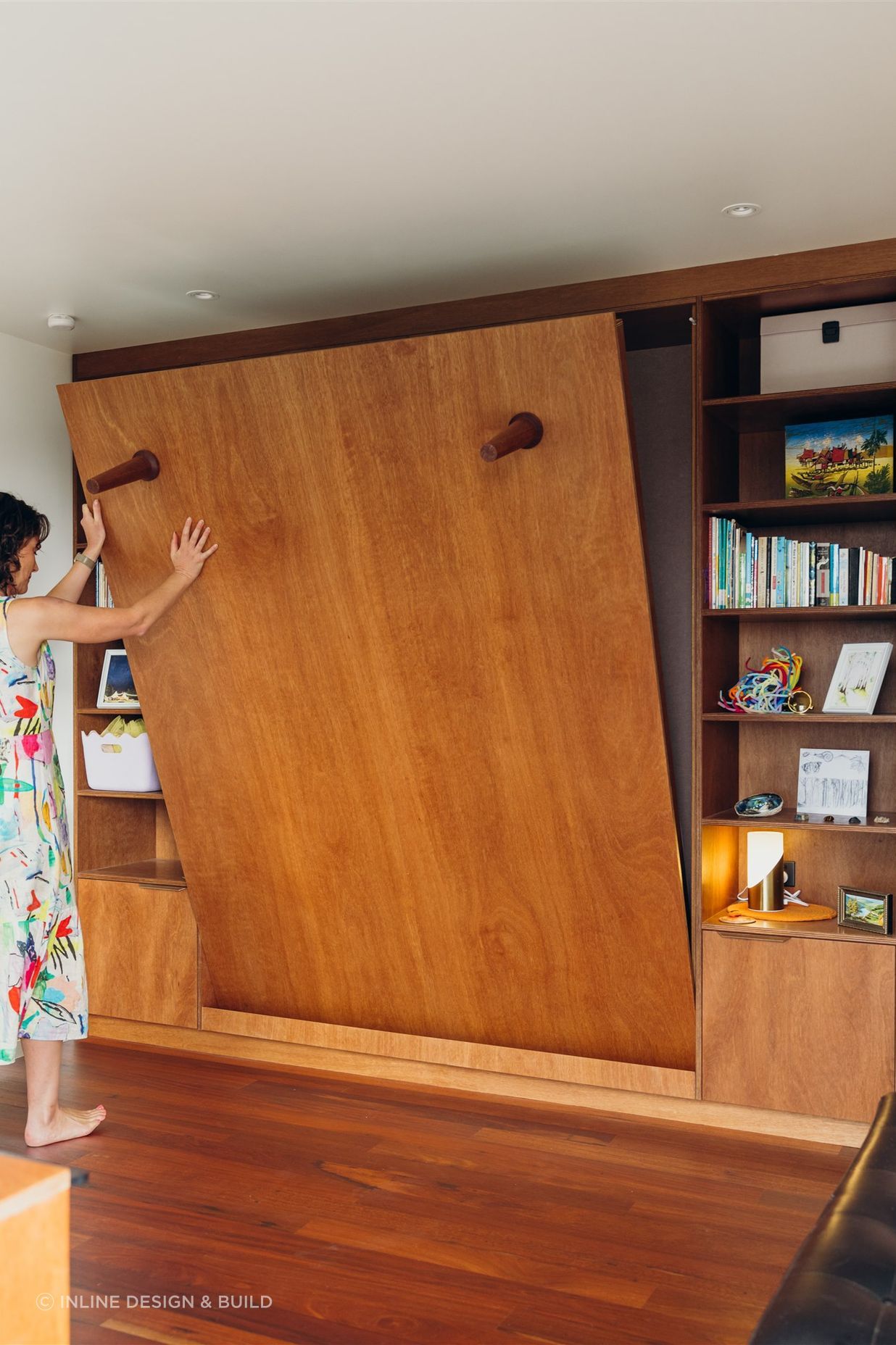 Solid Timber legs locate magnetically to the base of the fold down bed. With a gentle pull this becomes a queen size spare bedroom.