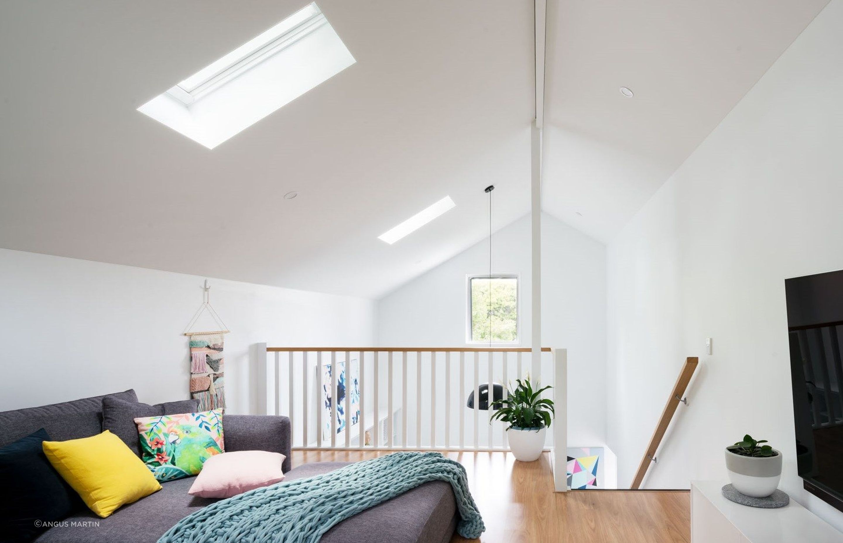 The 'media room' is a multifunction loft space above the master suite, with operable roof windows to vent any accumulation of heat in summer and ceate a natural cooling draft through the new wing.